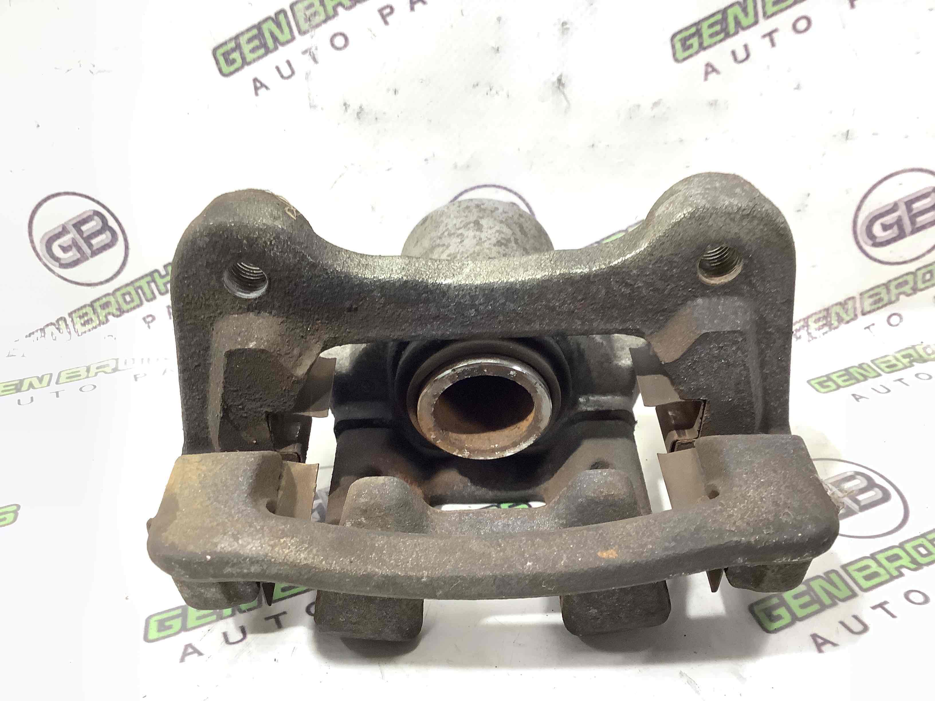 Супорт задній лівий