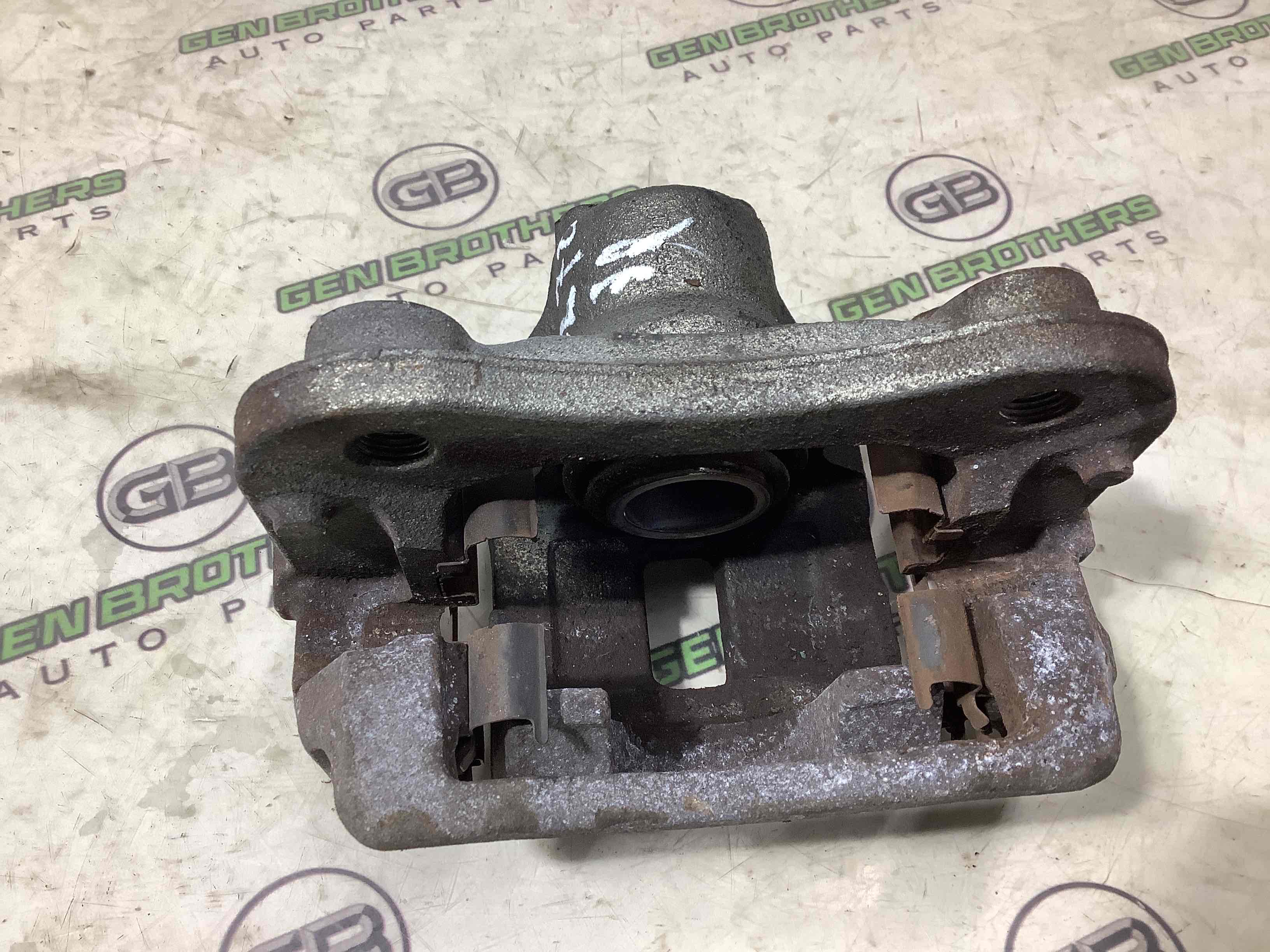 Супорт задній правий