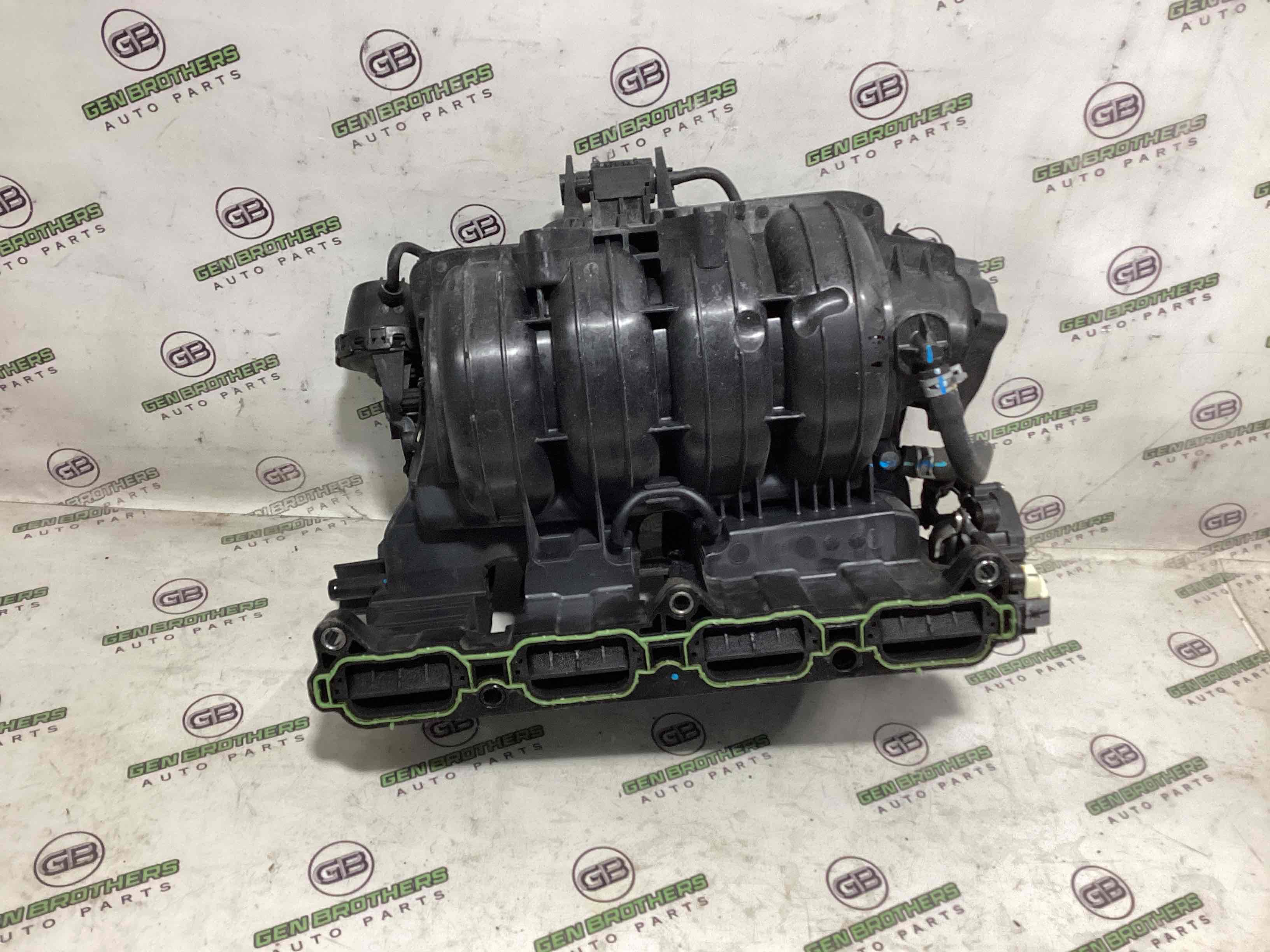 Колектор впускний