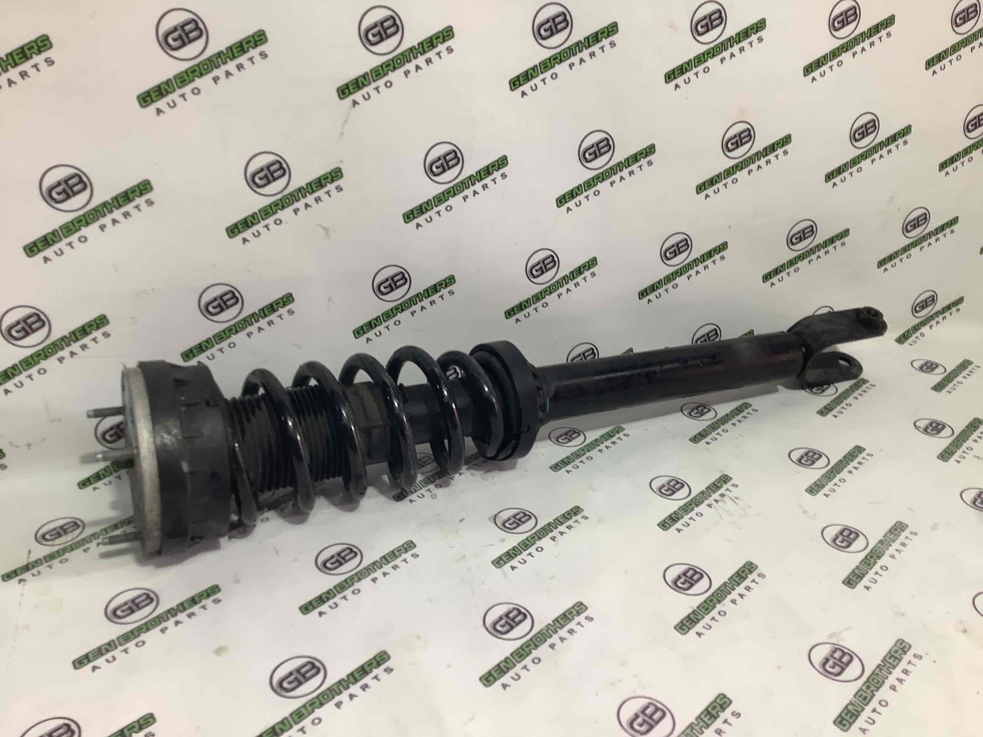 Амортизатор передній лівий