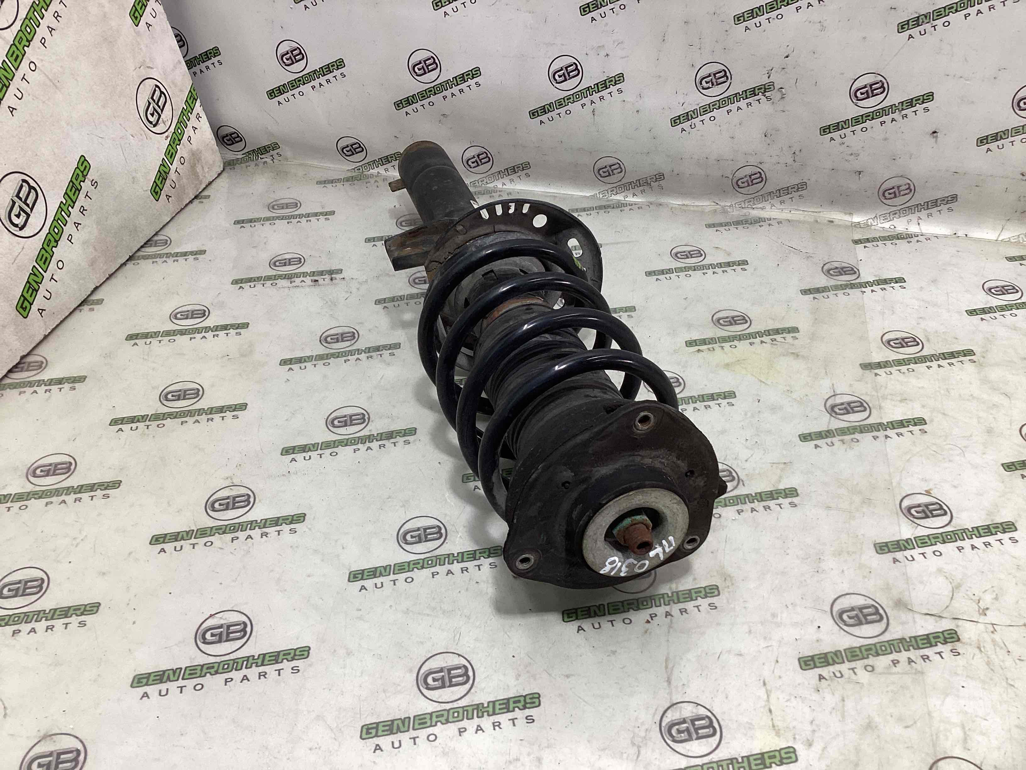 Амортизатор передній лівий