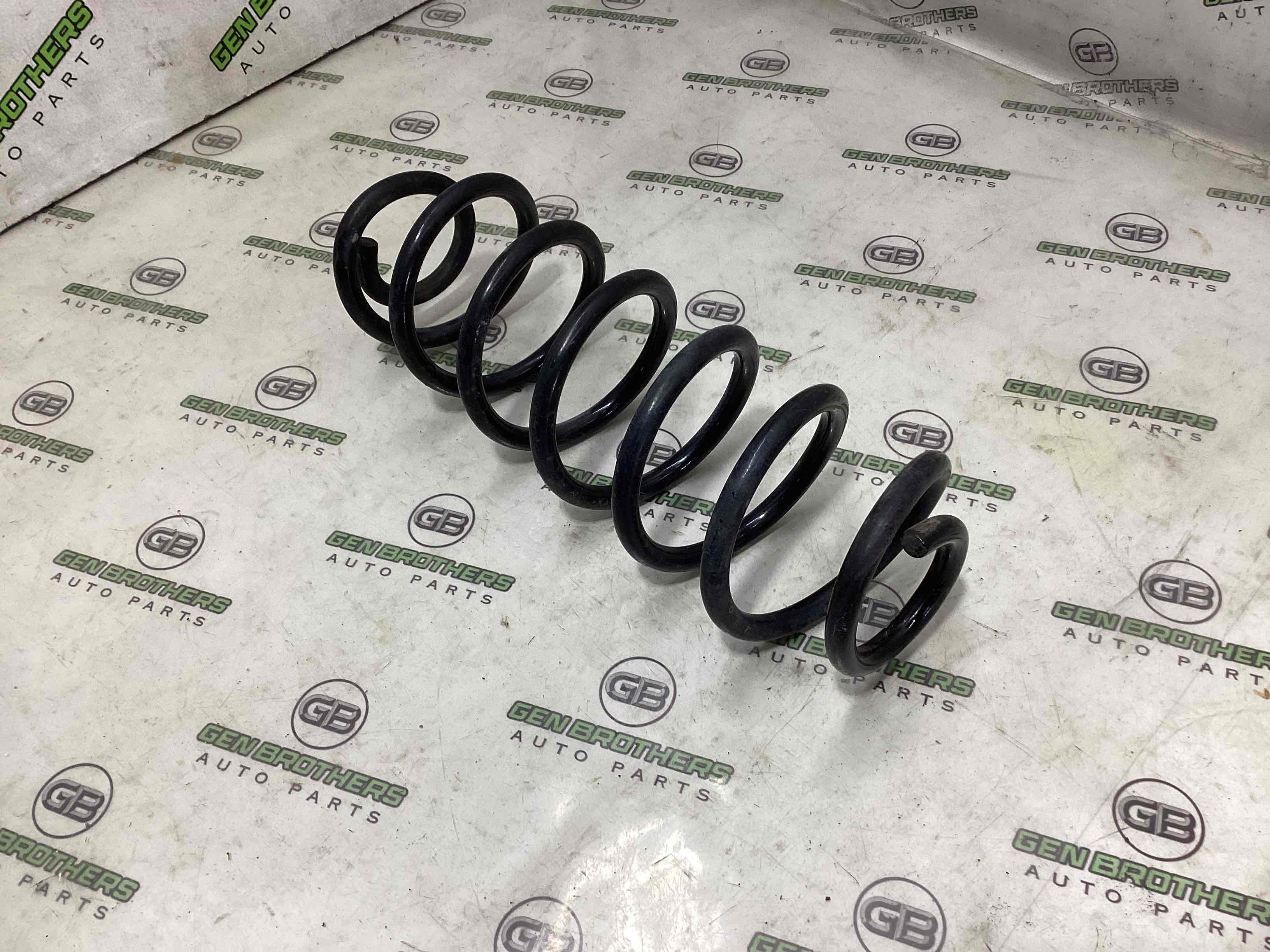 Пружина задня