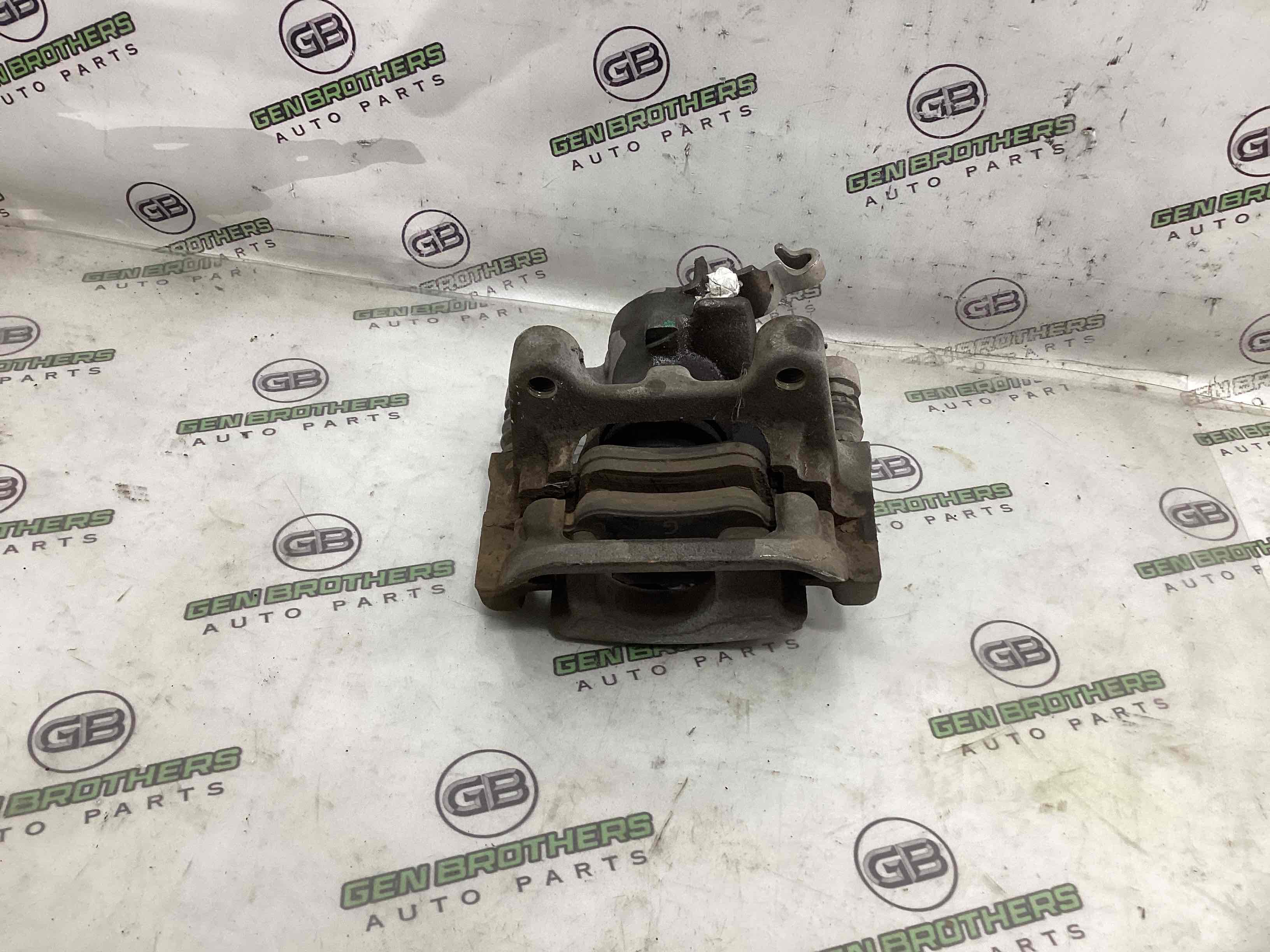 Супорт задній правий