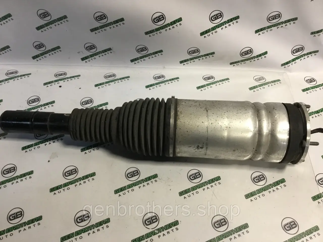 Амортизатор передній лівий