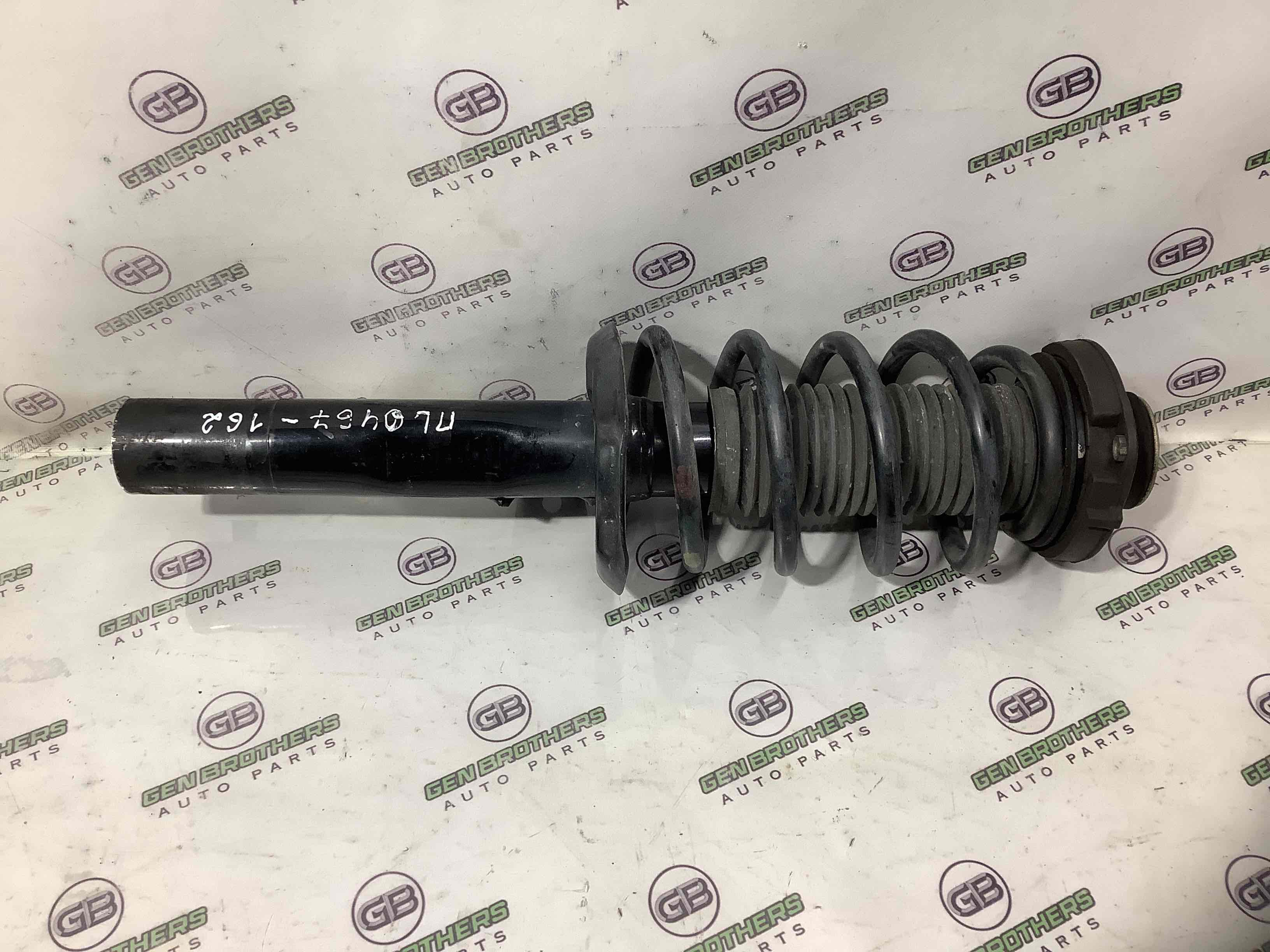 Амортизатор передній лівий