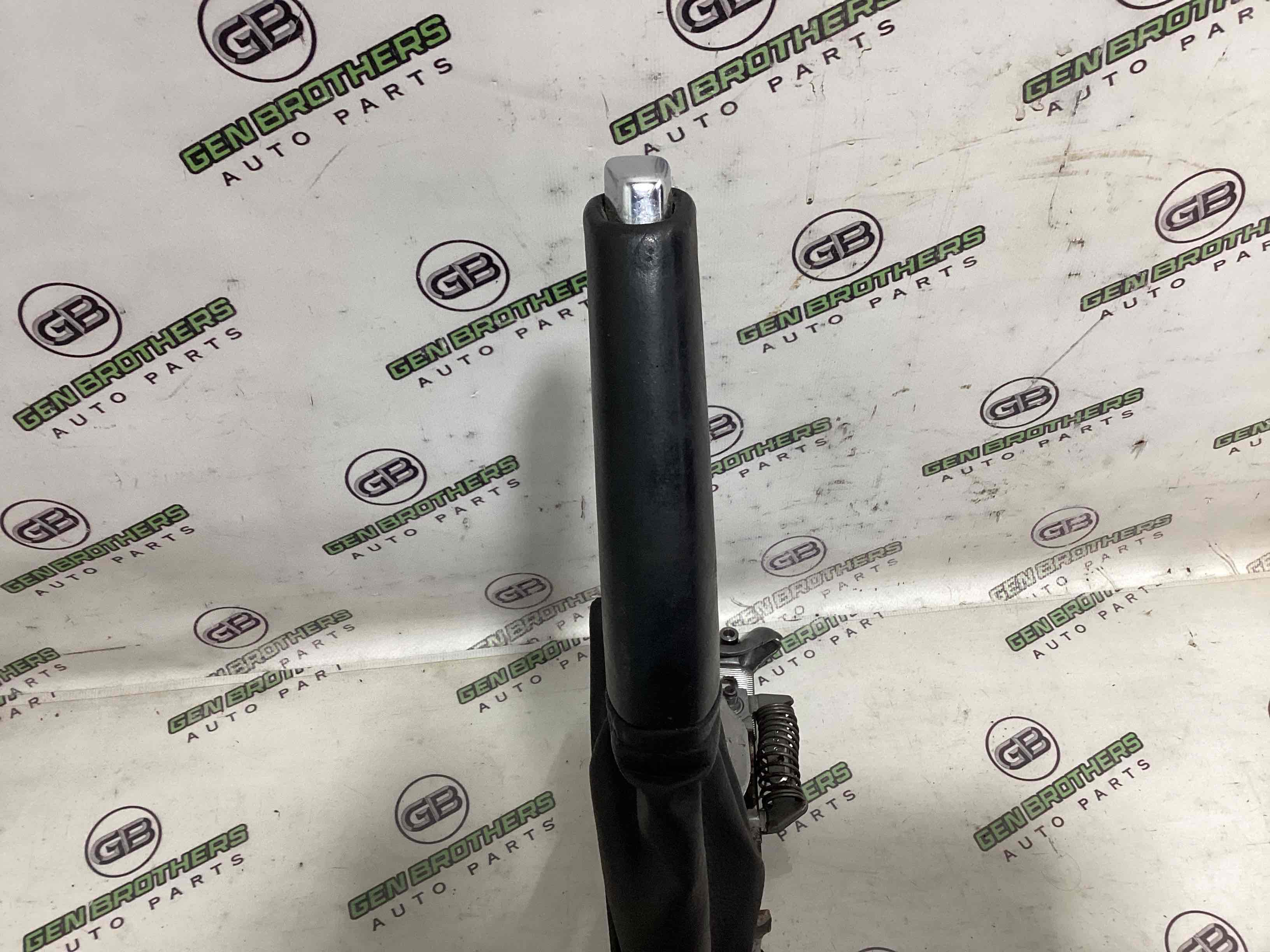 Важель ручного гальма