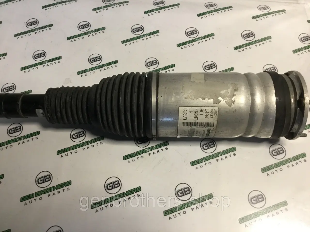 Амортизатор передній лівий