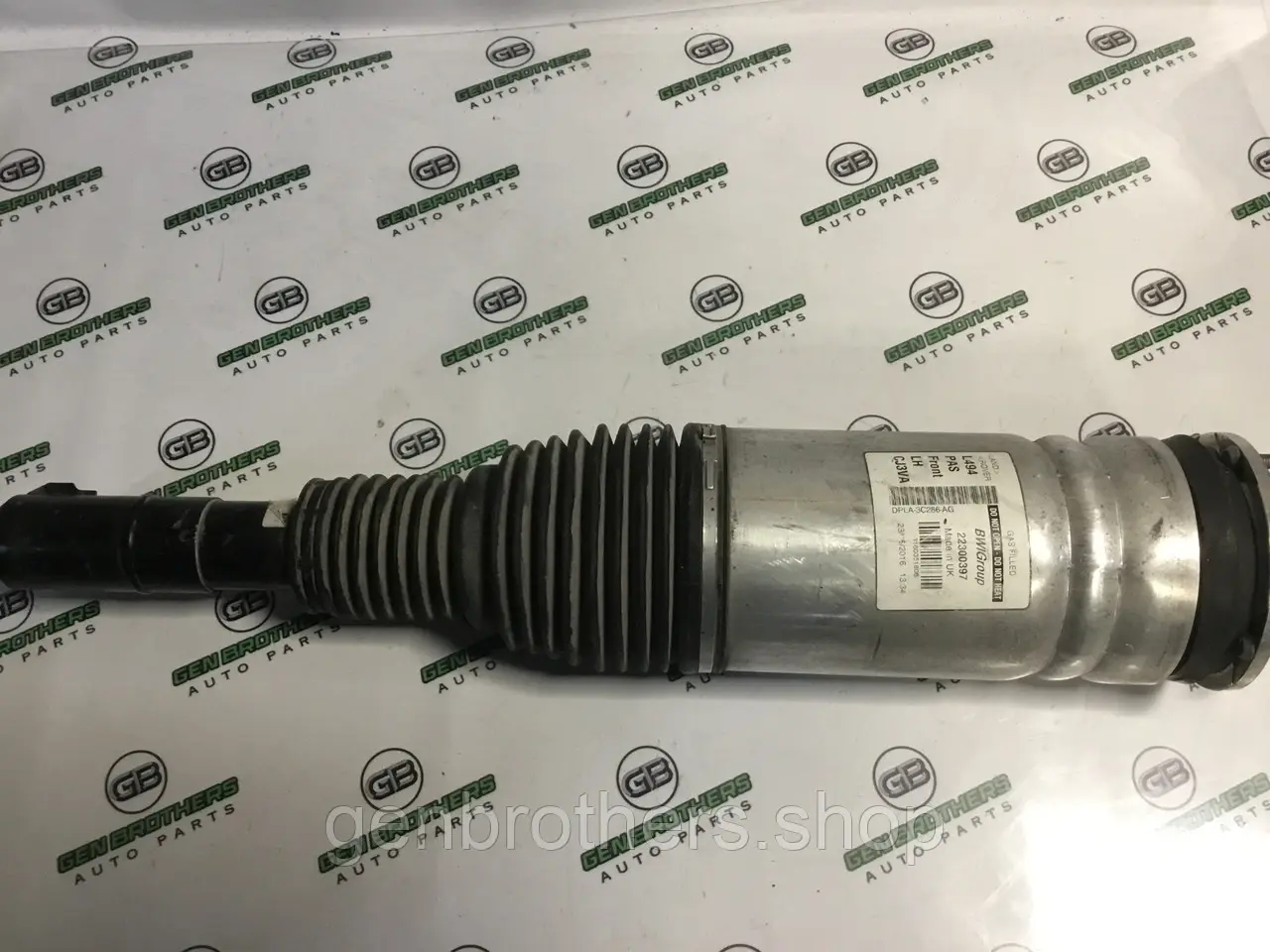 Амортизатор передній лівий