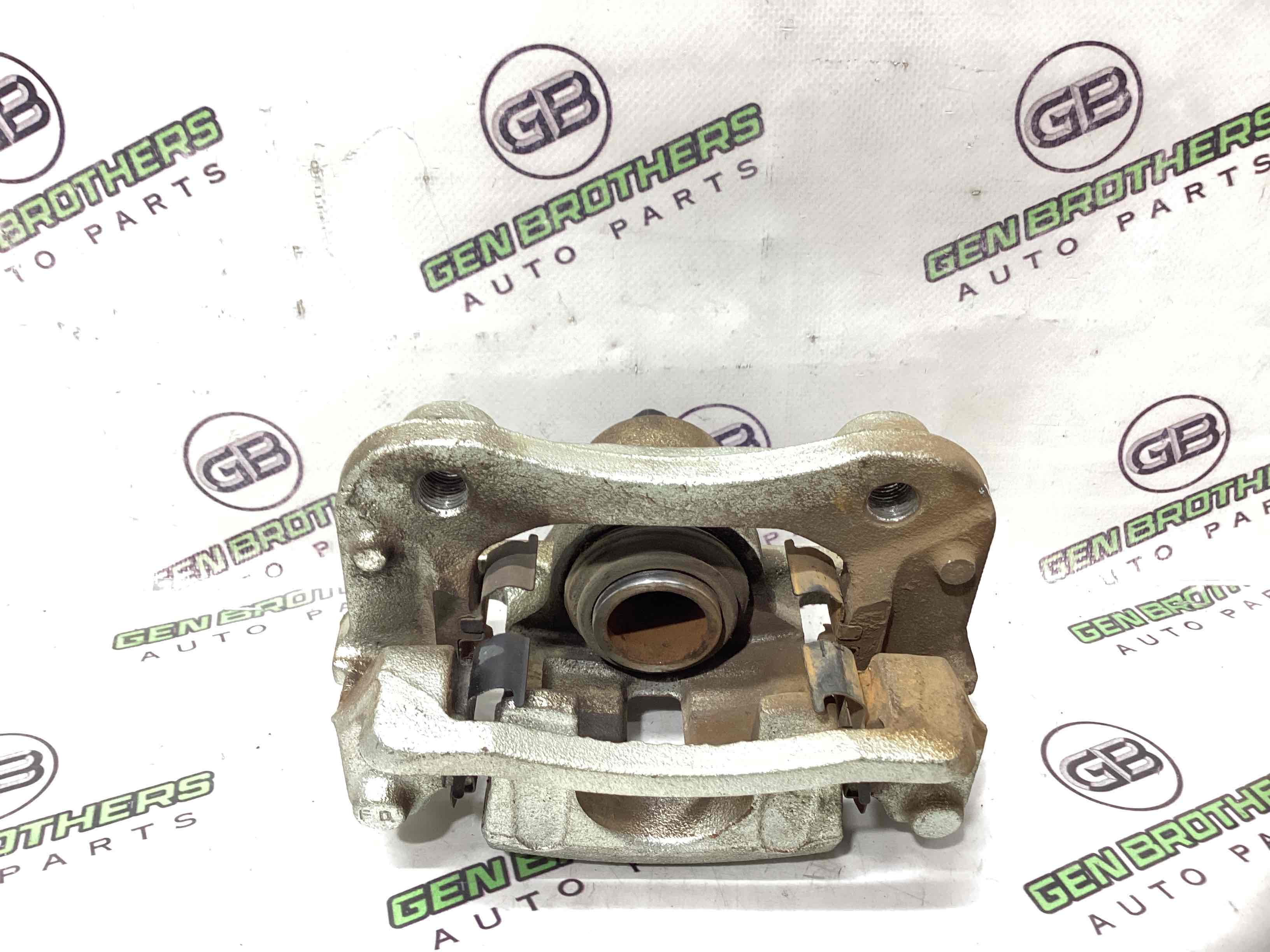 Супорт задній правий