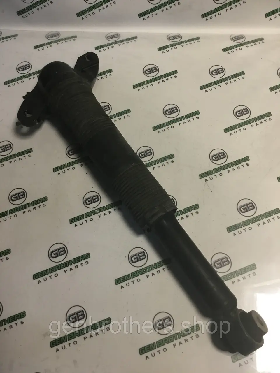 Амортизатор задній правий