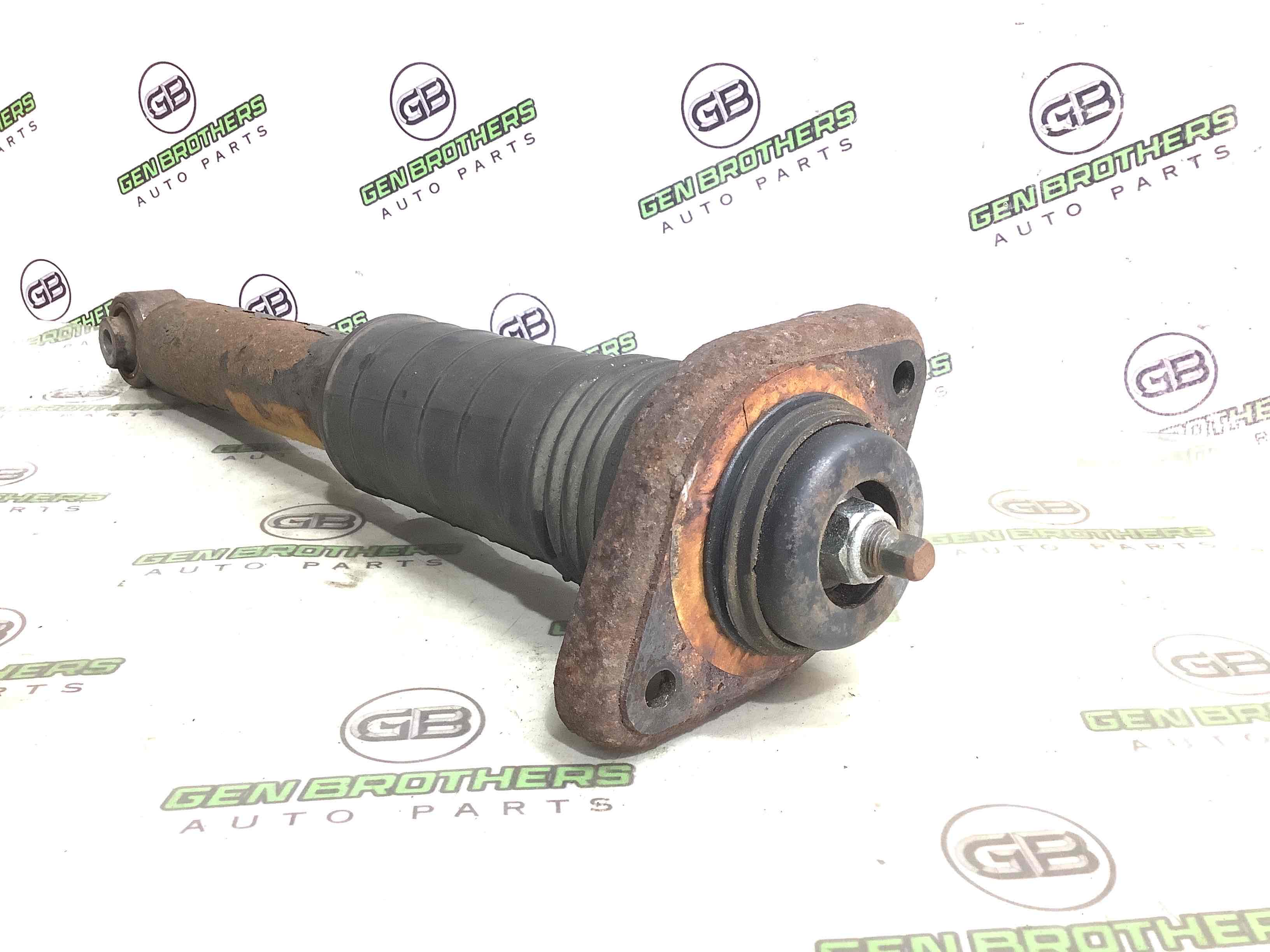 Амортизатор задній лівий