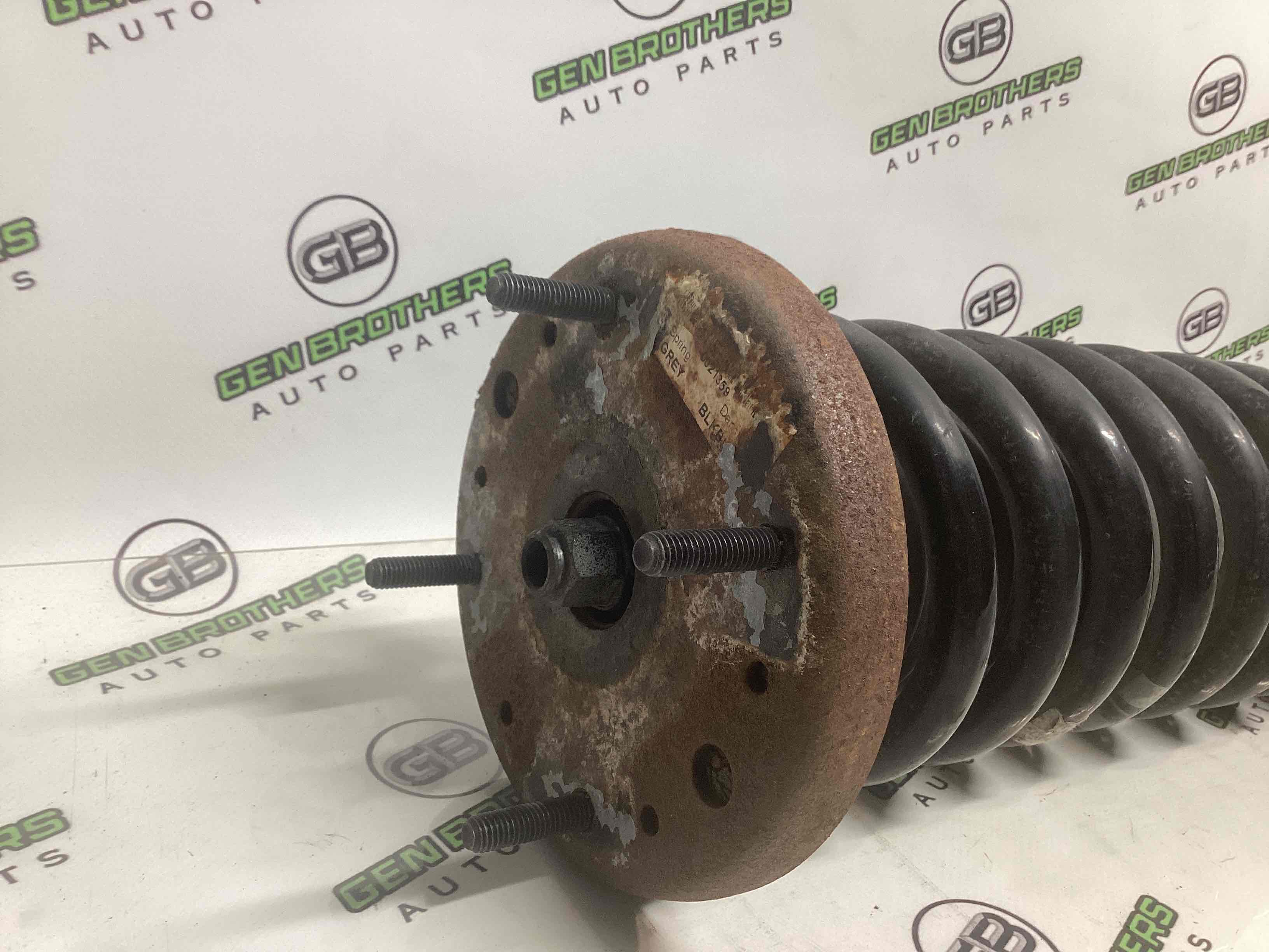 Амортизатор передній лівий