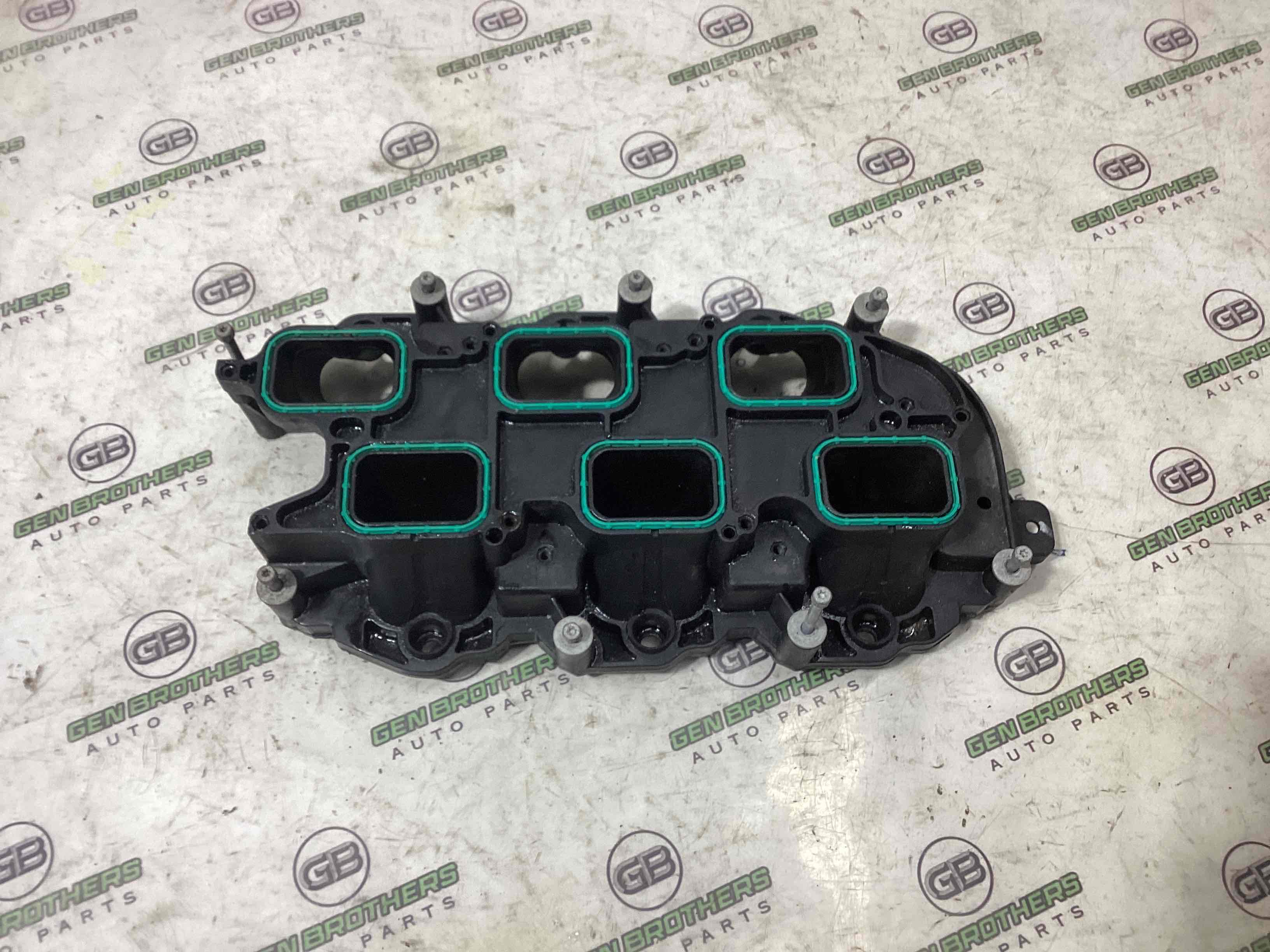 Колектор впускний