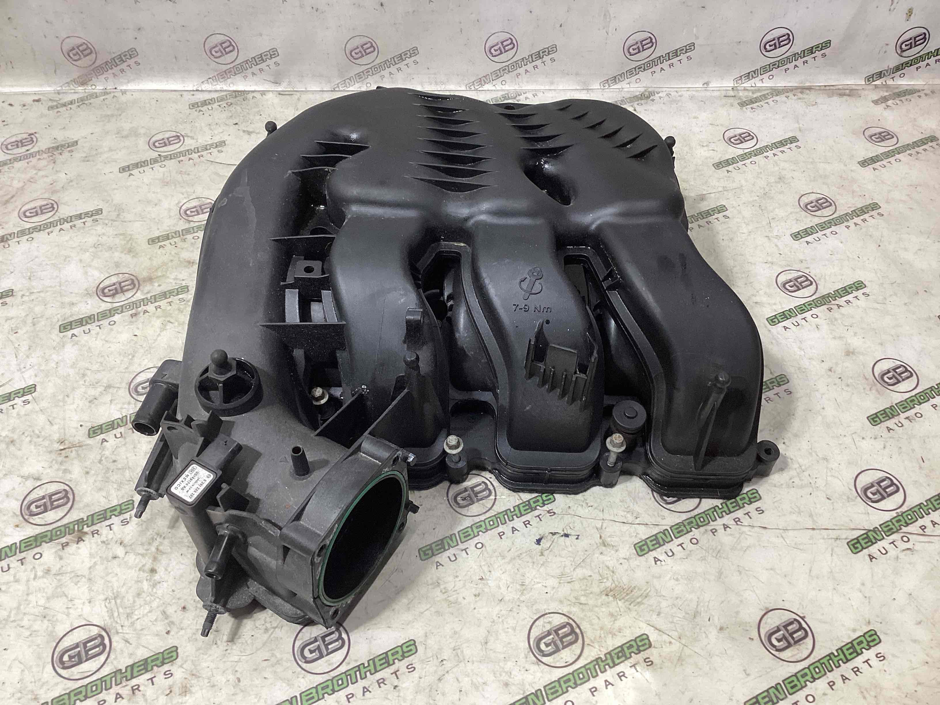 Колектор впускний