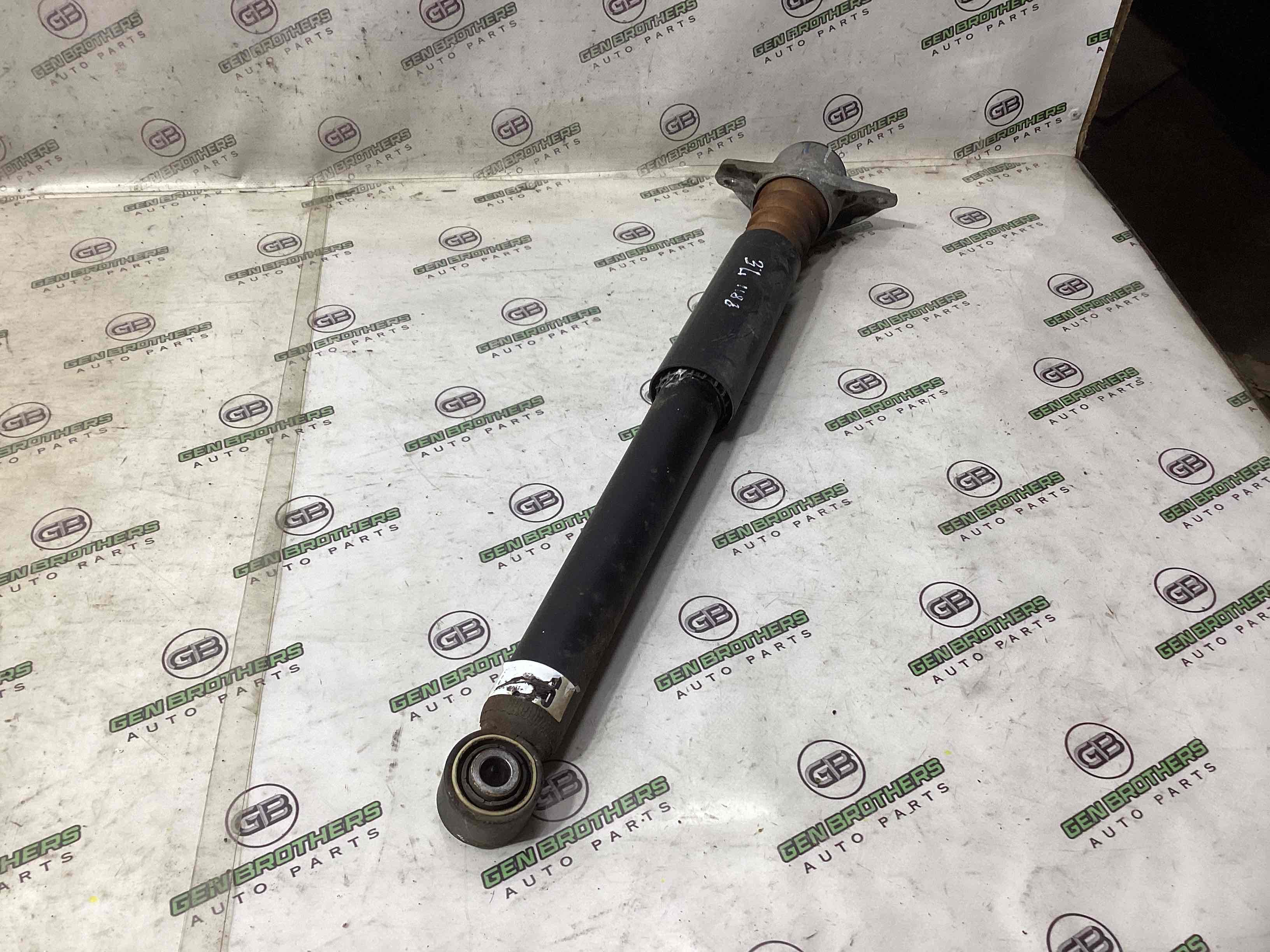 Амортизатор задний левый