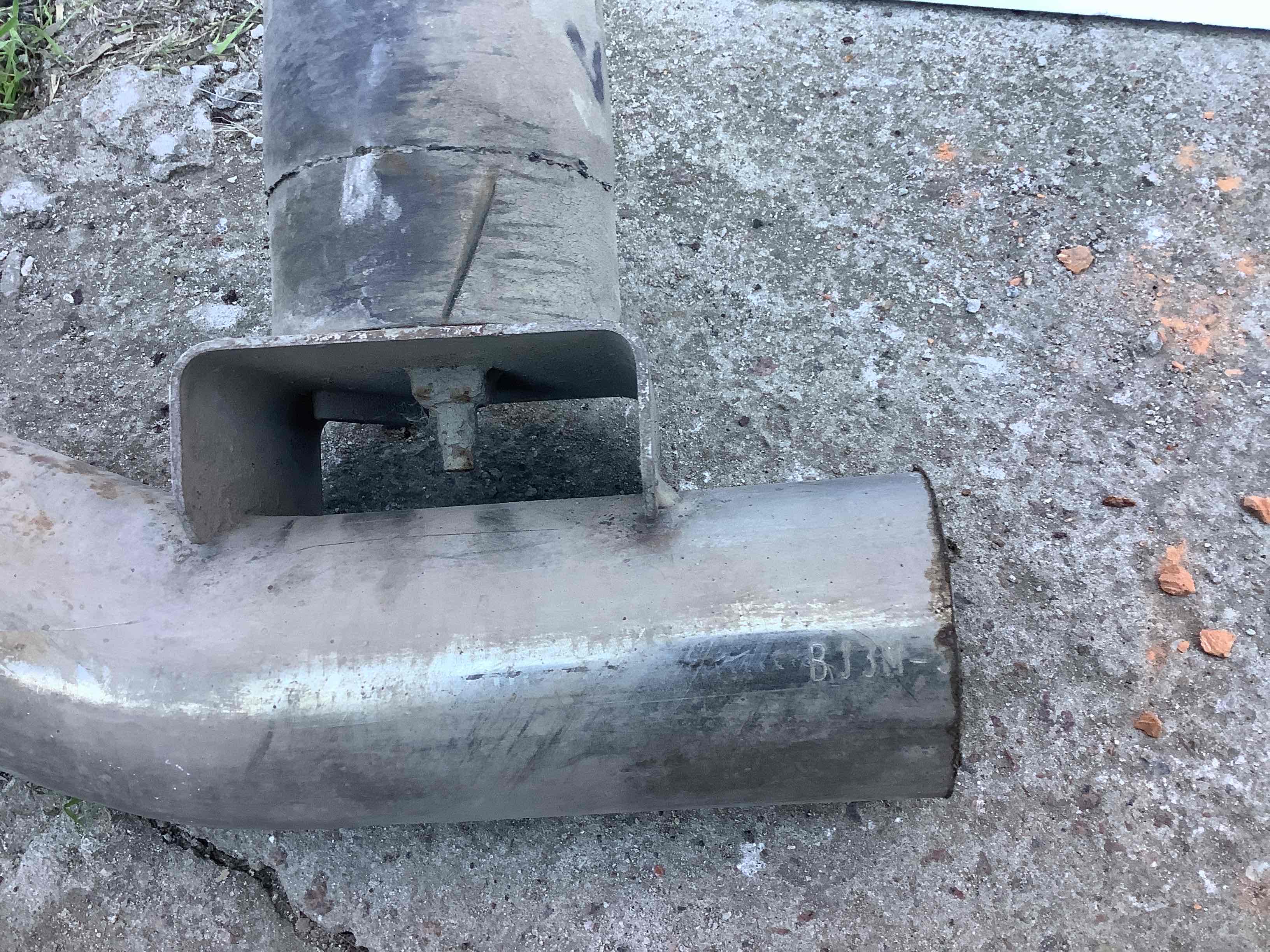 Приемная труба глушителя