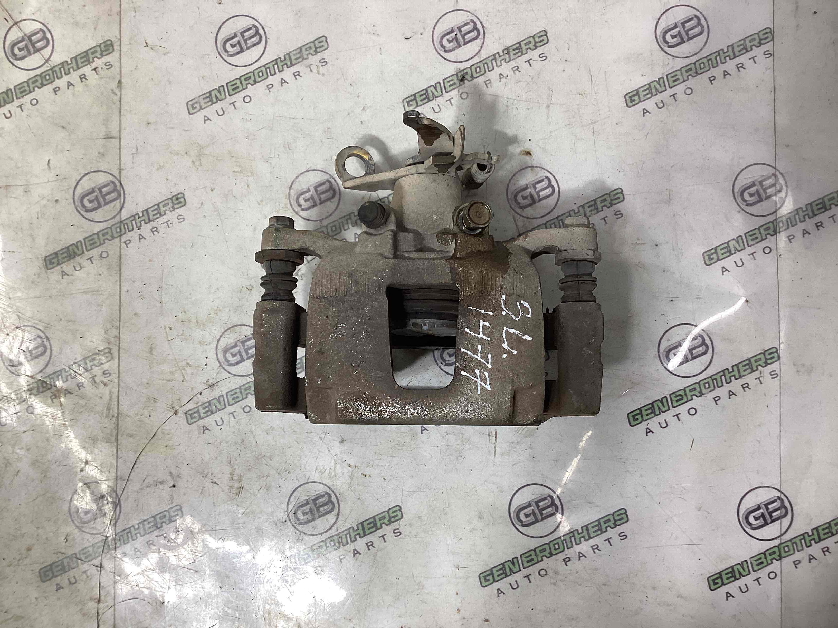 Суппорт задний левый