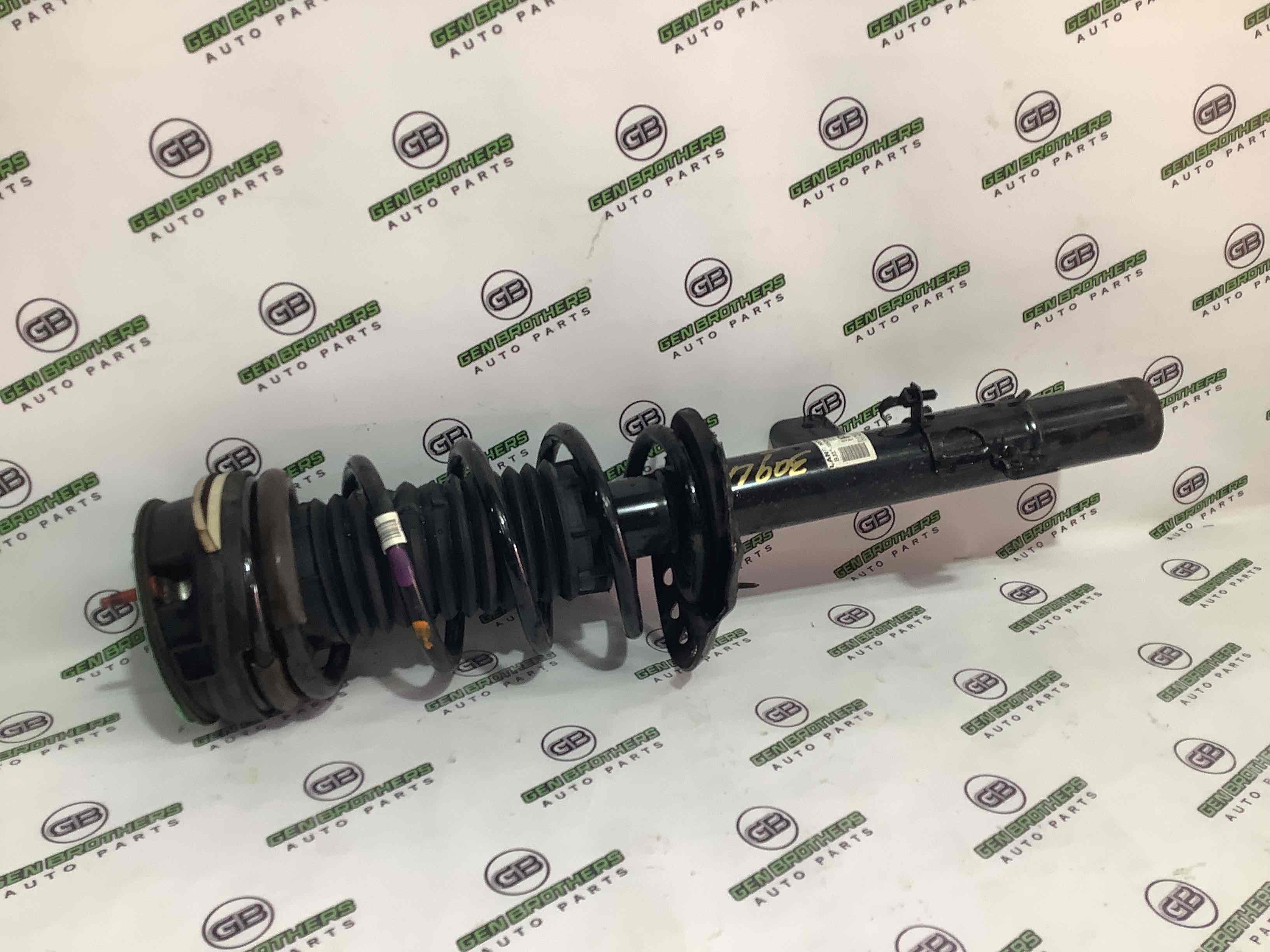 Амортизатор задний левый