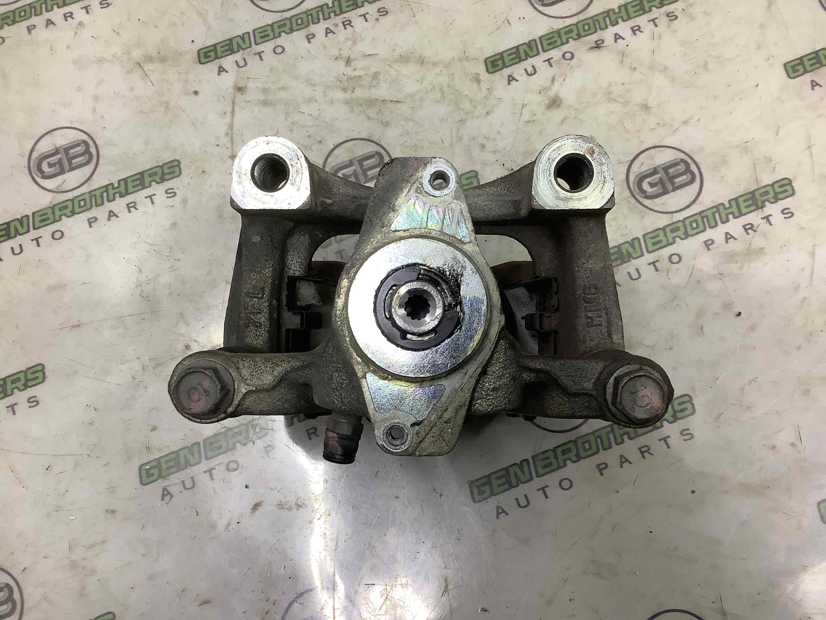 Супорт задній лівий