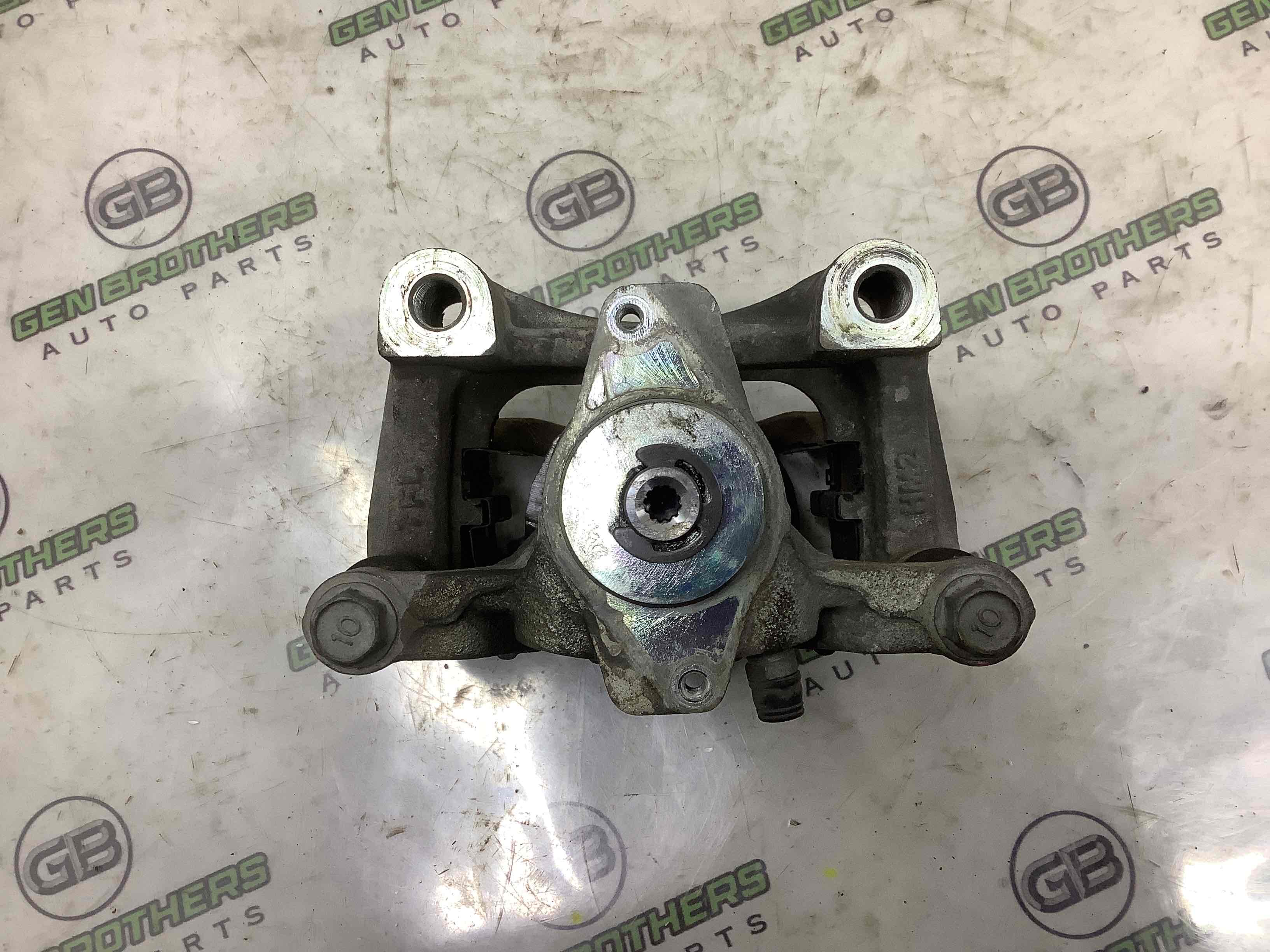 Супорт задній правий