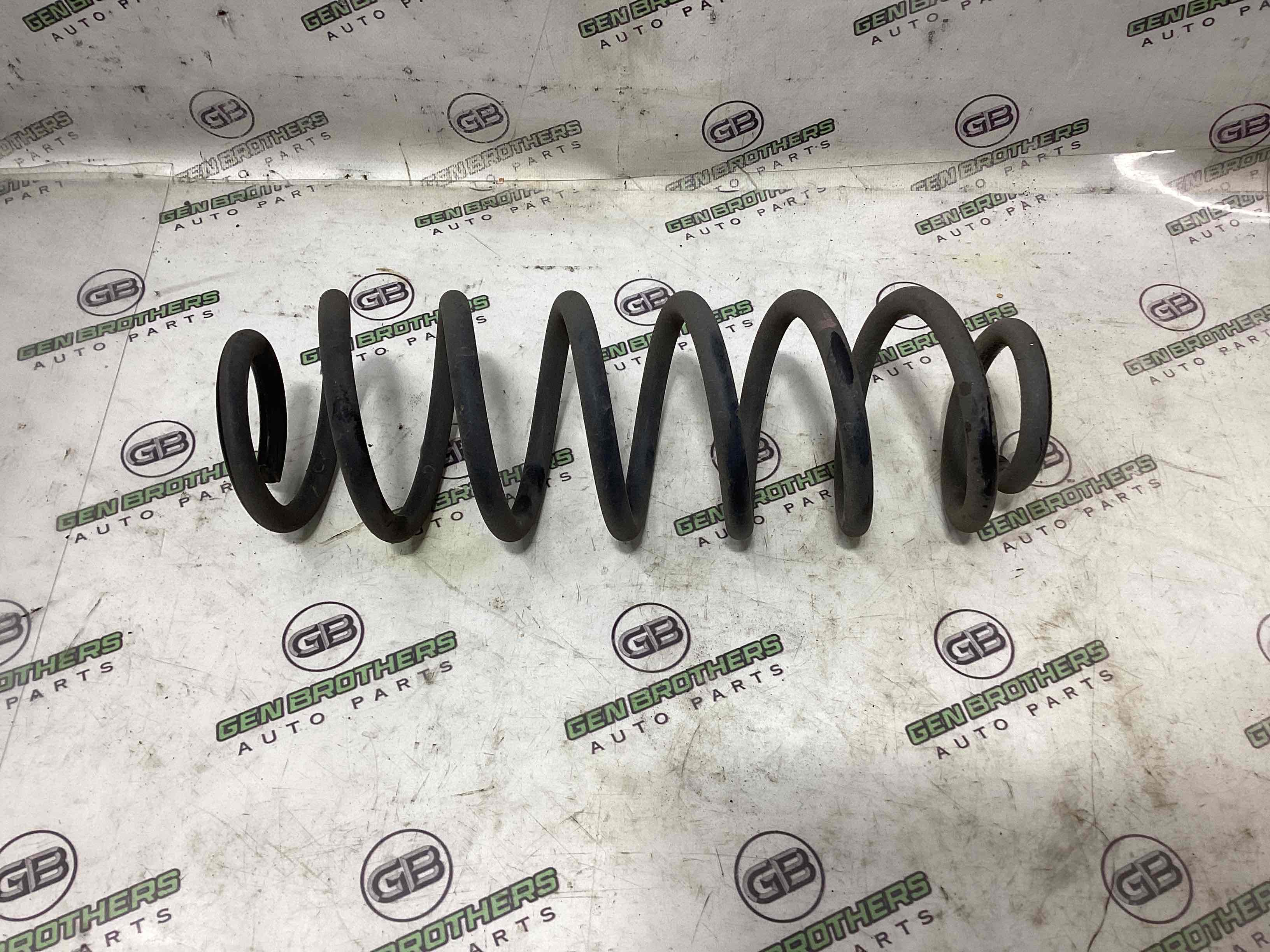 Пружина задня