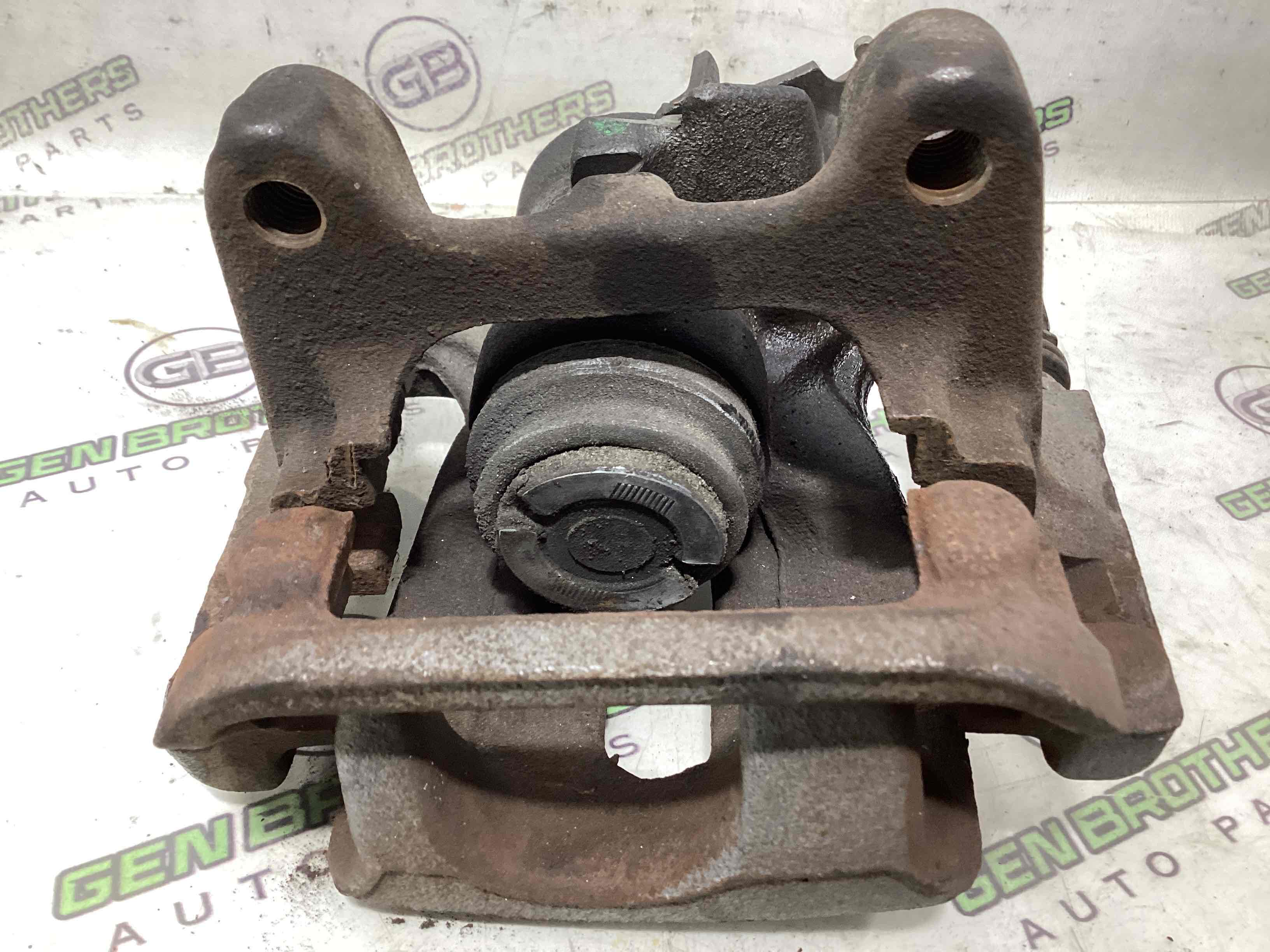 Супорт задній правий