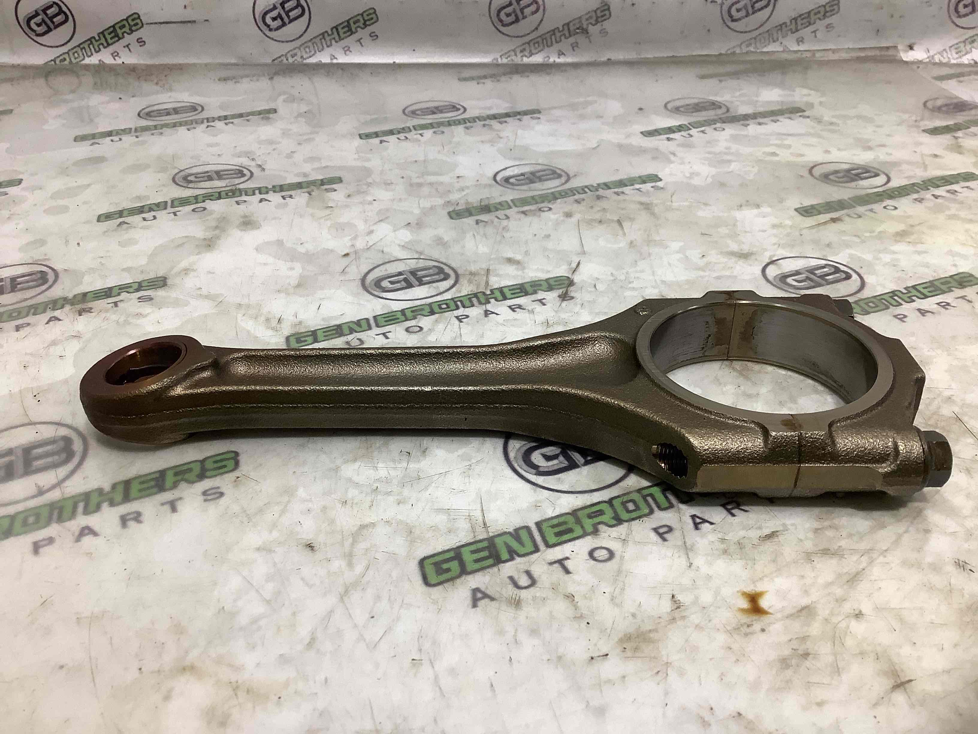 Шатун поршня двигуна