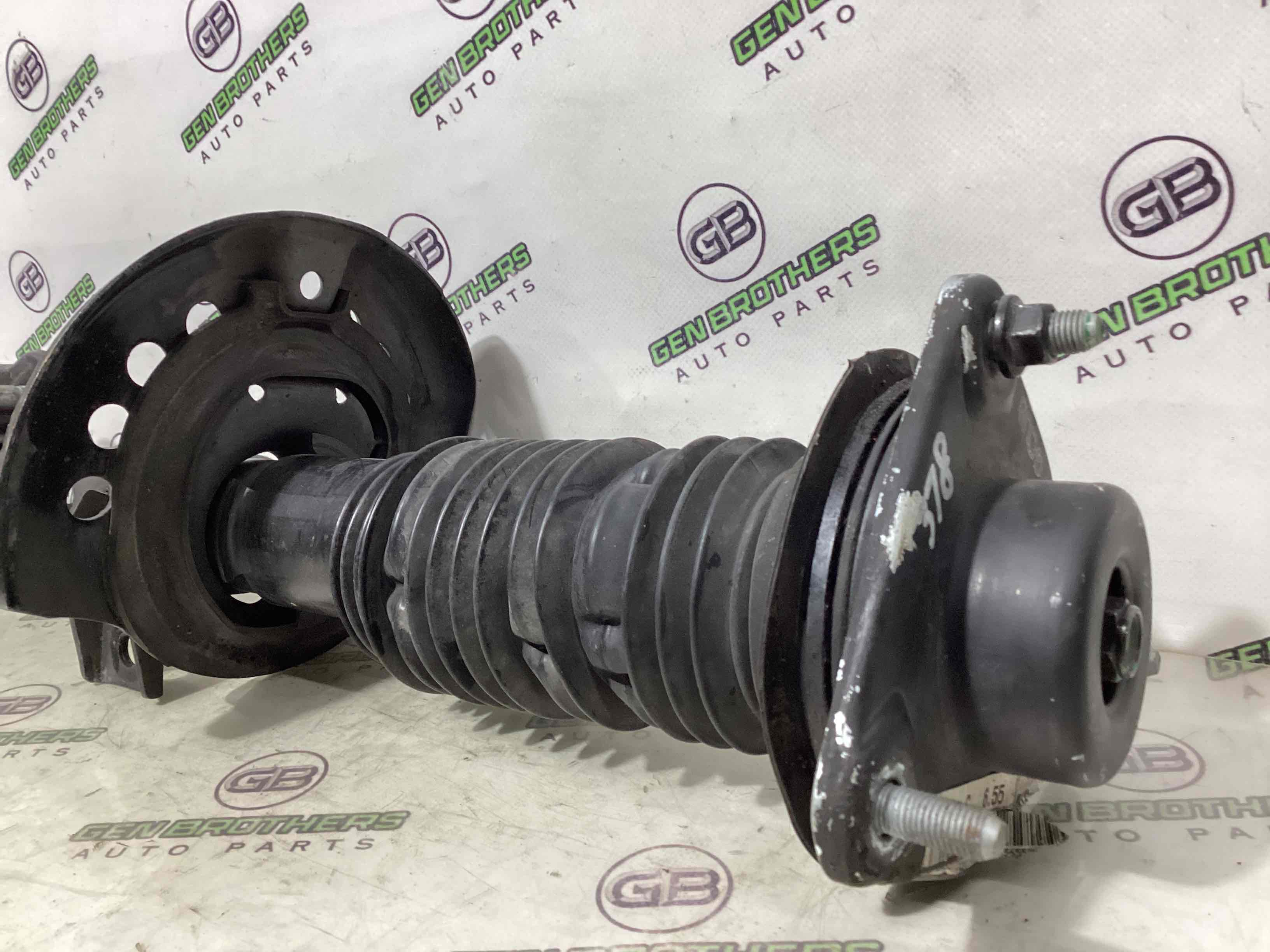 Амортизатор передний левый