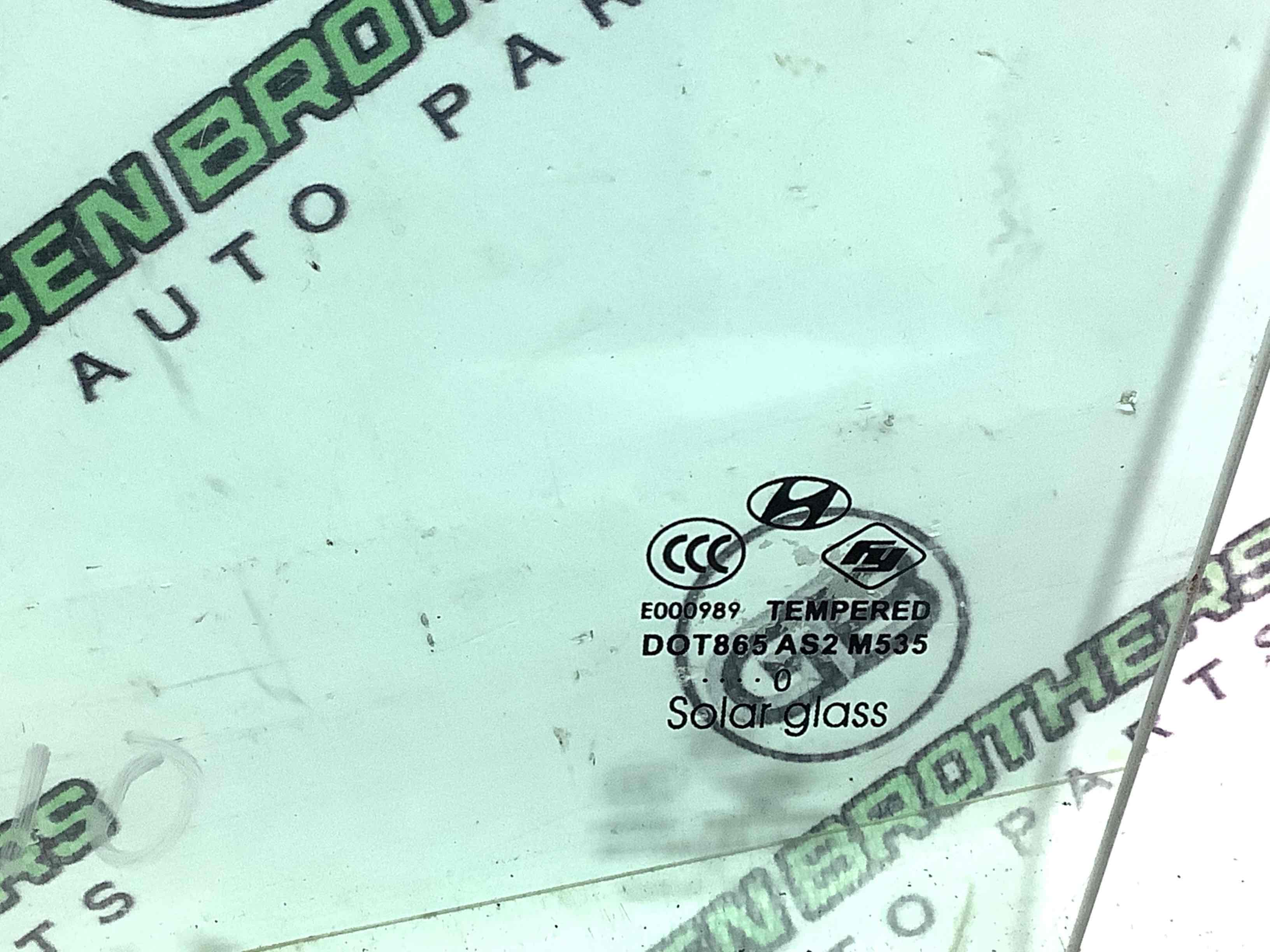 Стекло заднее левое