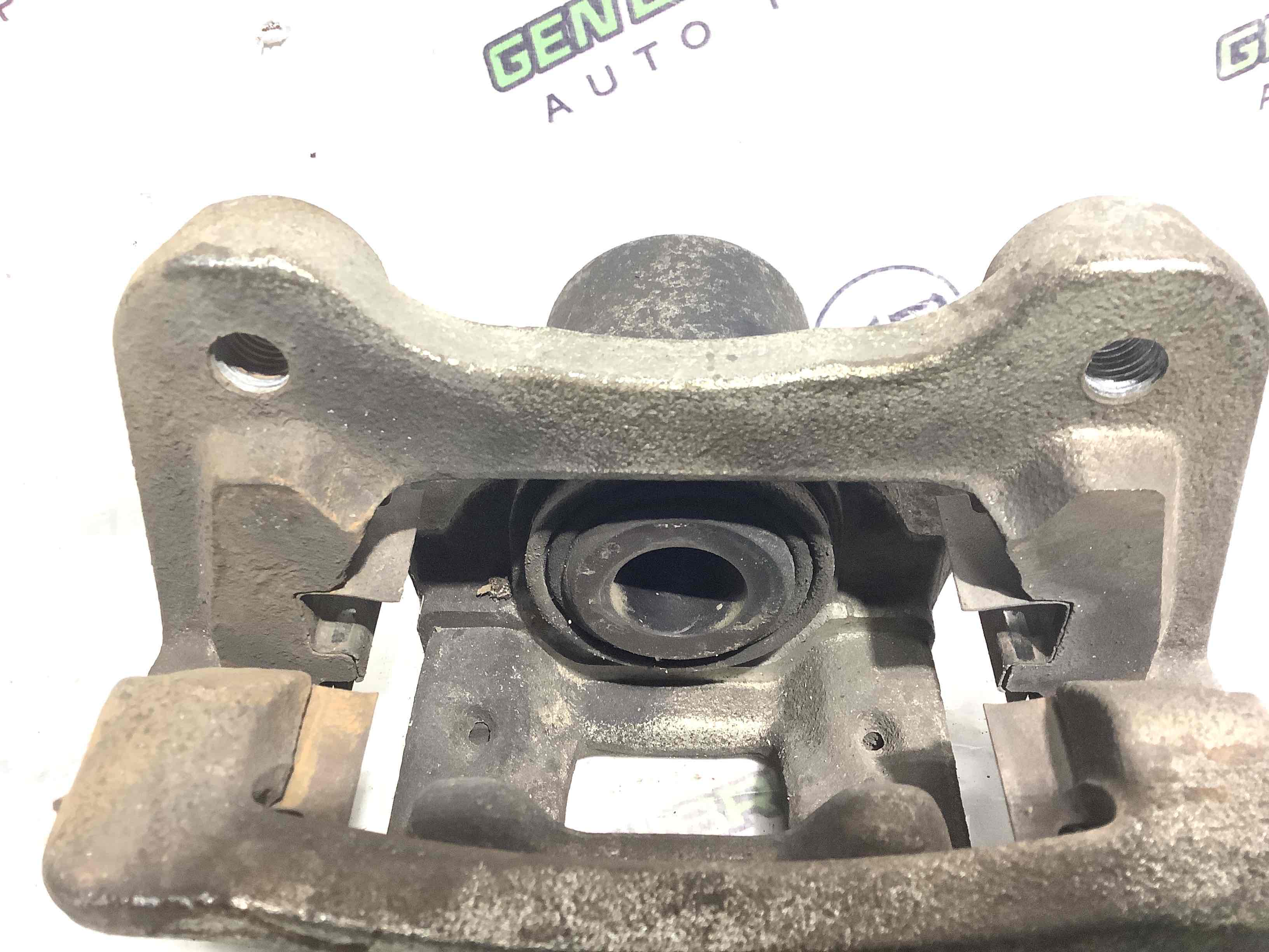 Суппорт задний левый