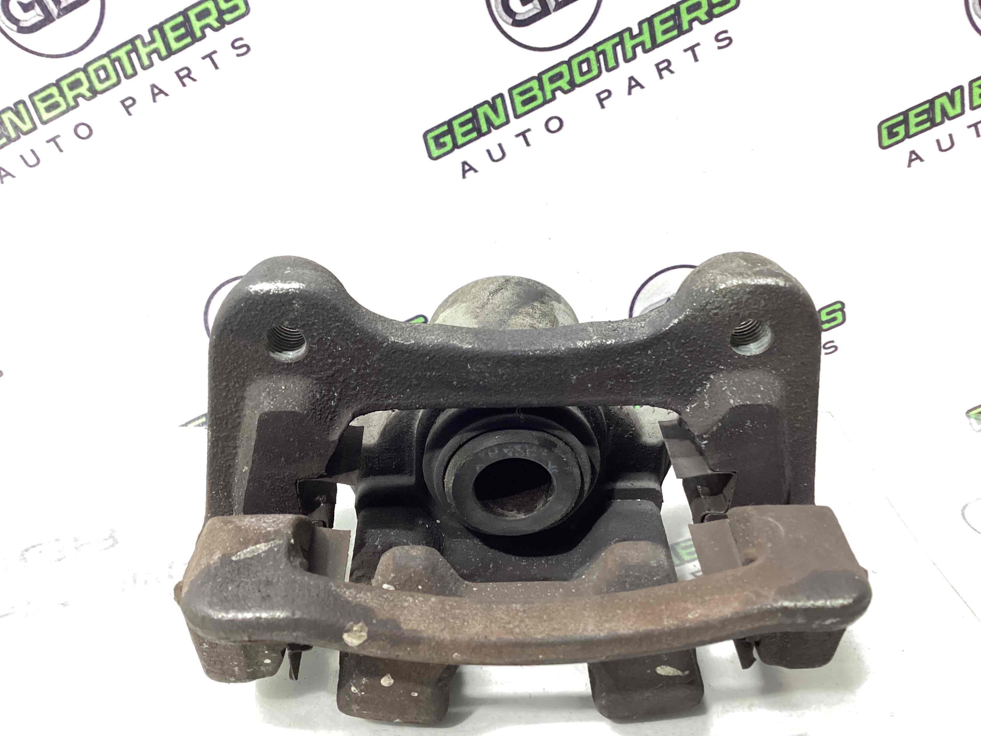 Суппорт задний левый