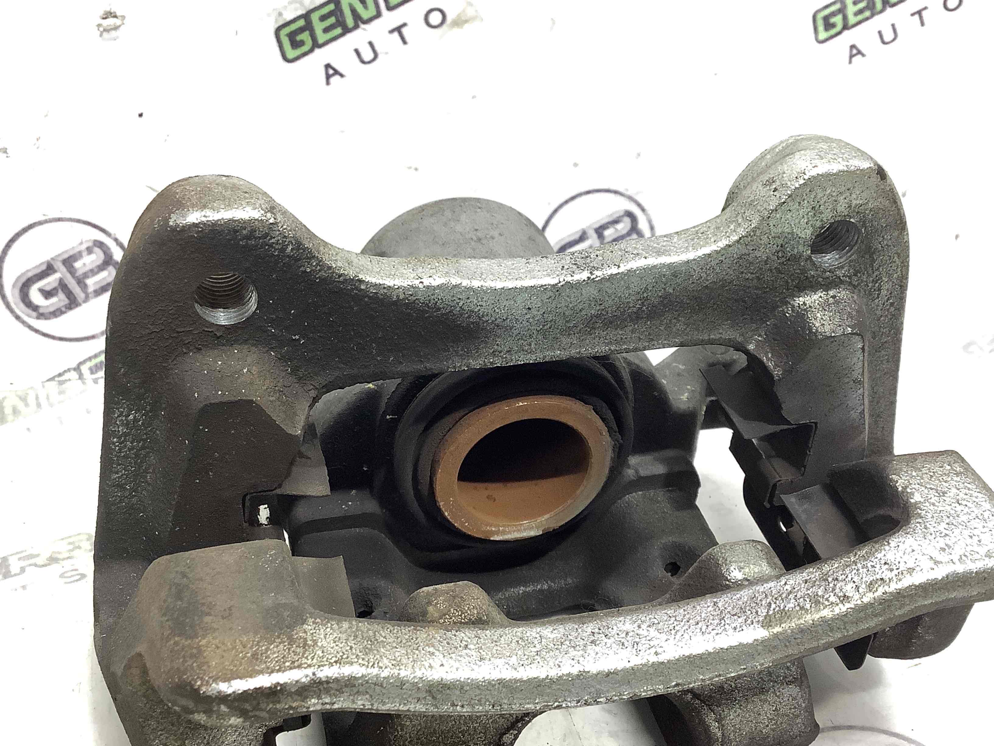 Суппорт задний левый