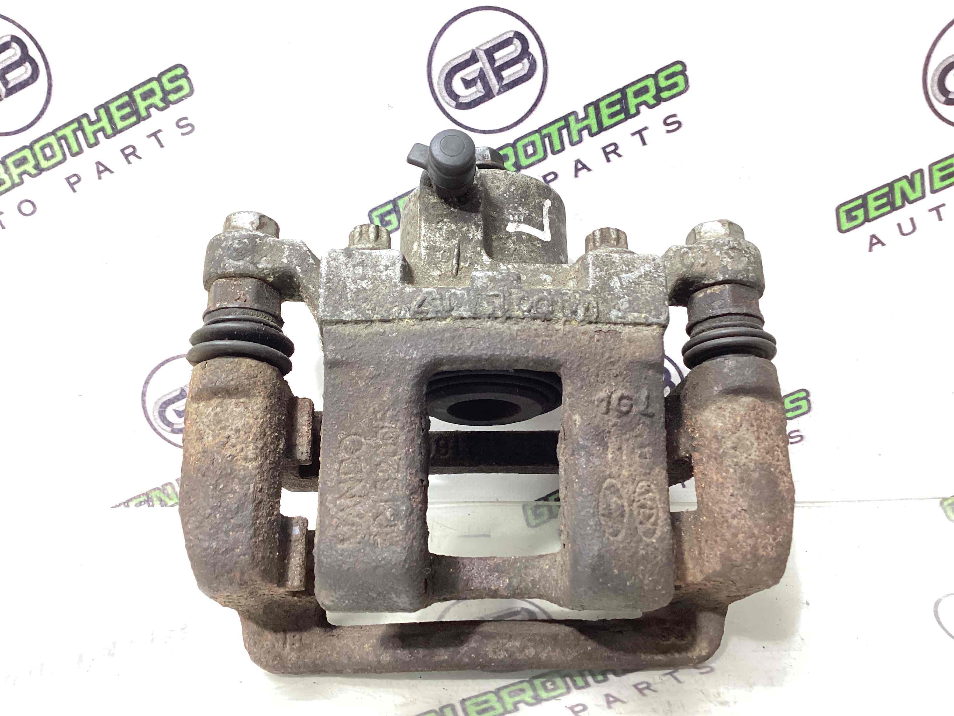 Суппорт задний левый