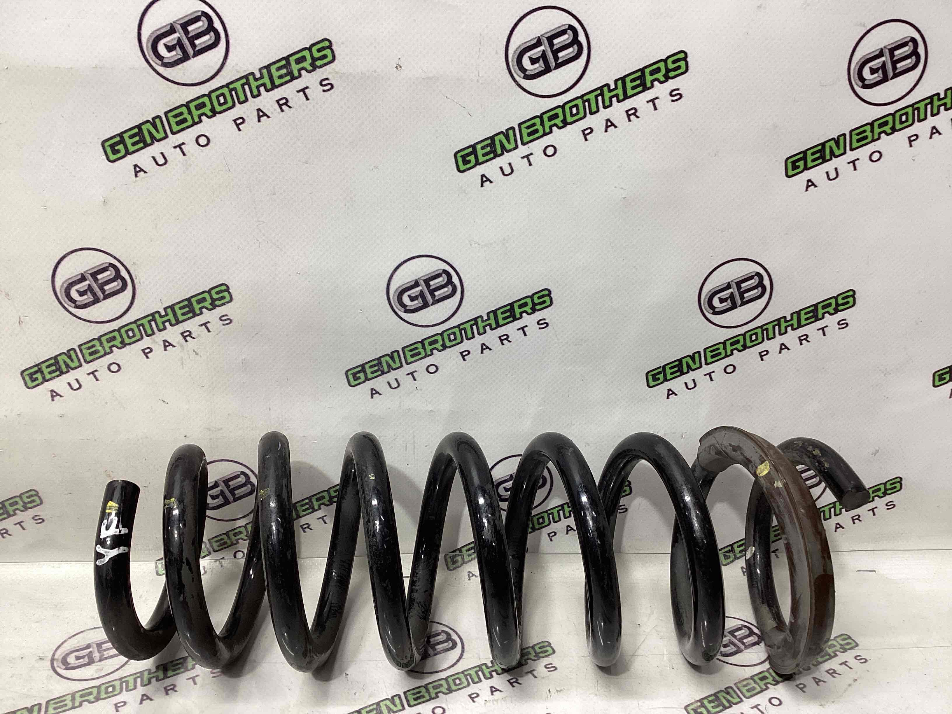 Пружина задняя