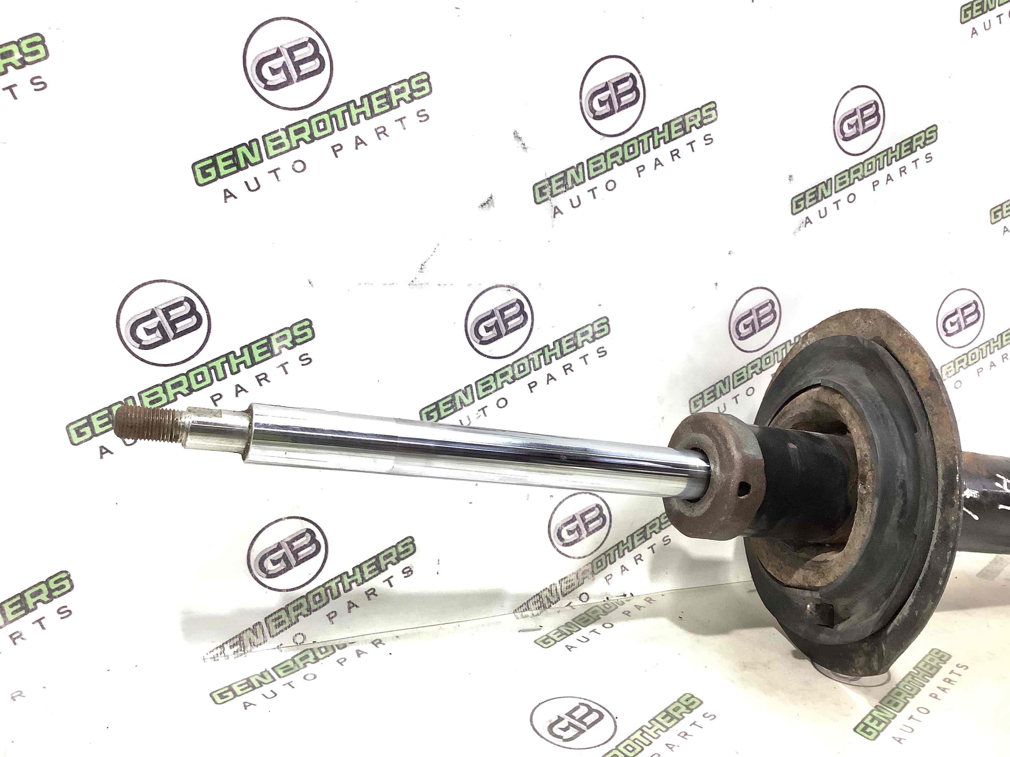 Амортизатор передний левый