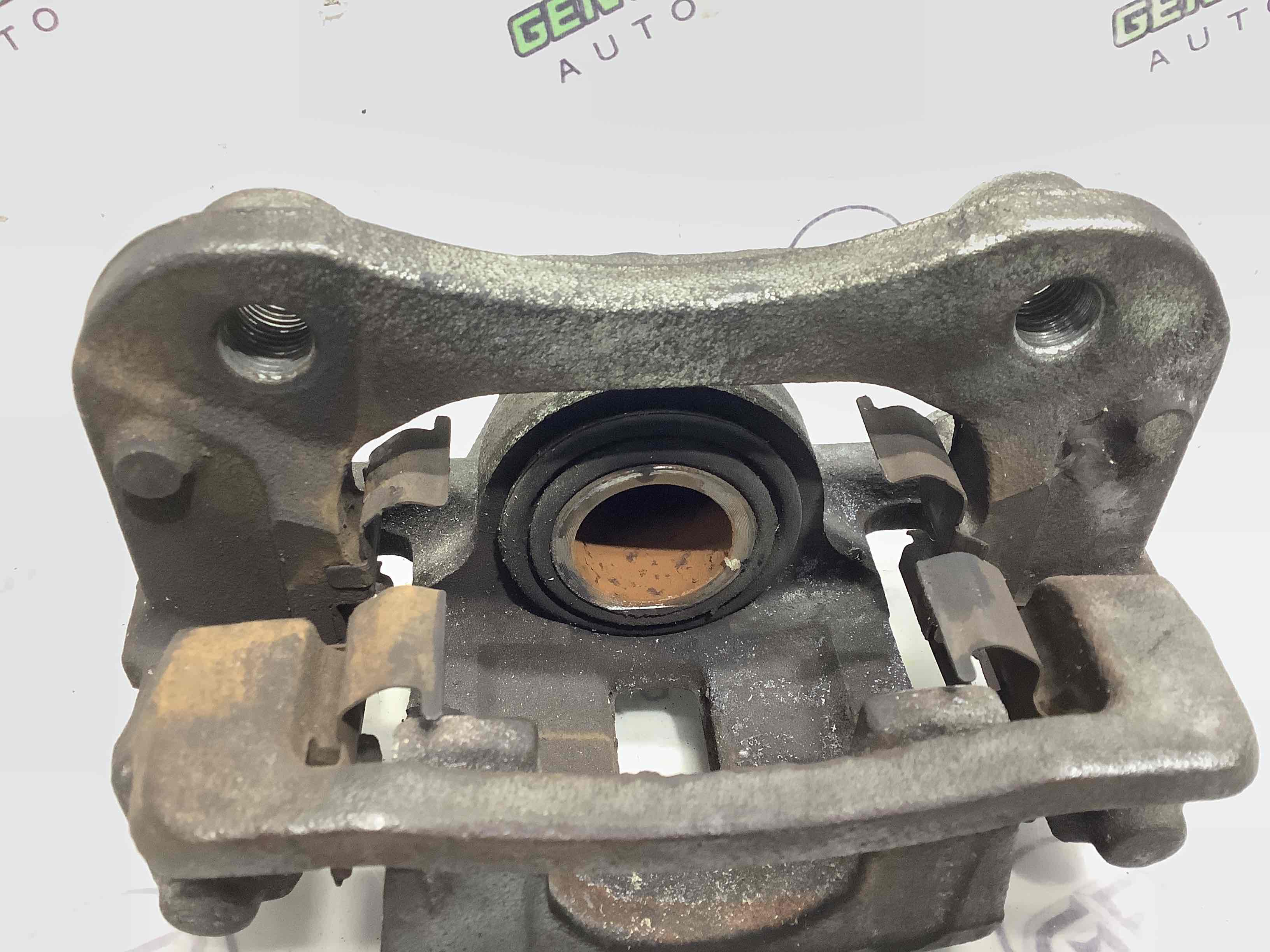 Супорт задній лівий