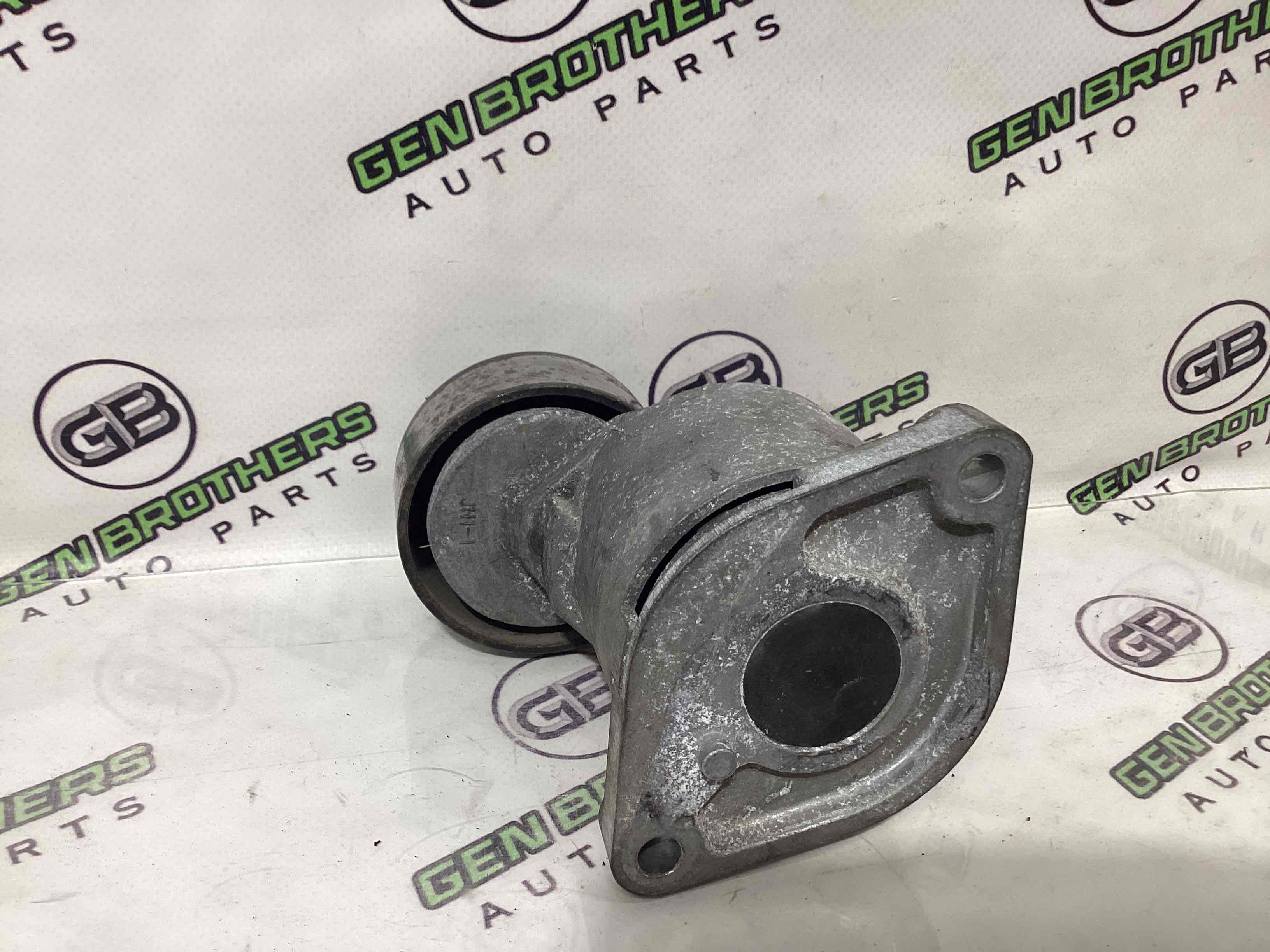 Механізм натягу ременя, ланцюга, ролика