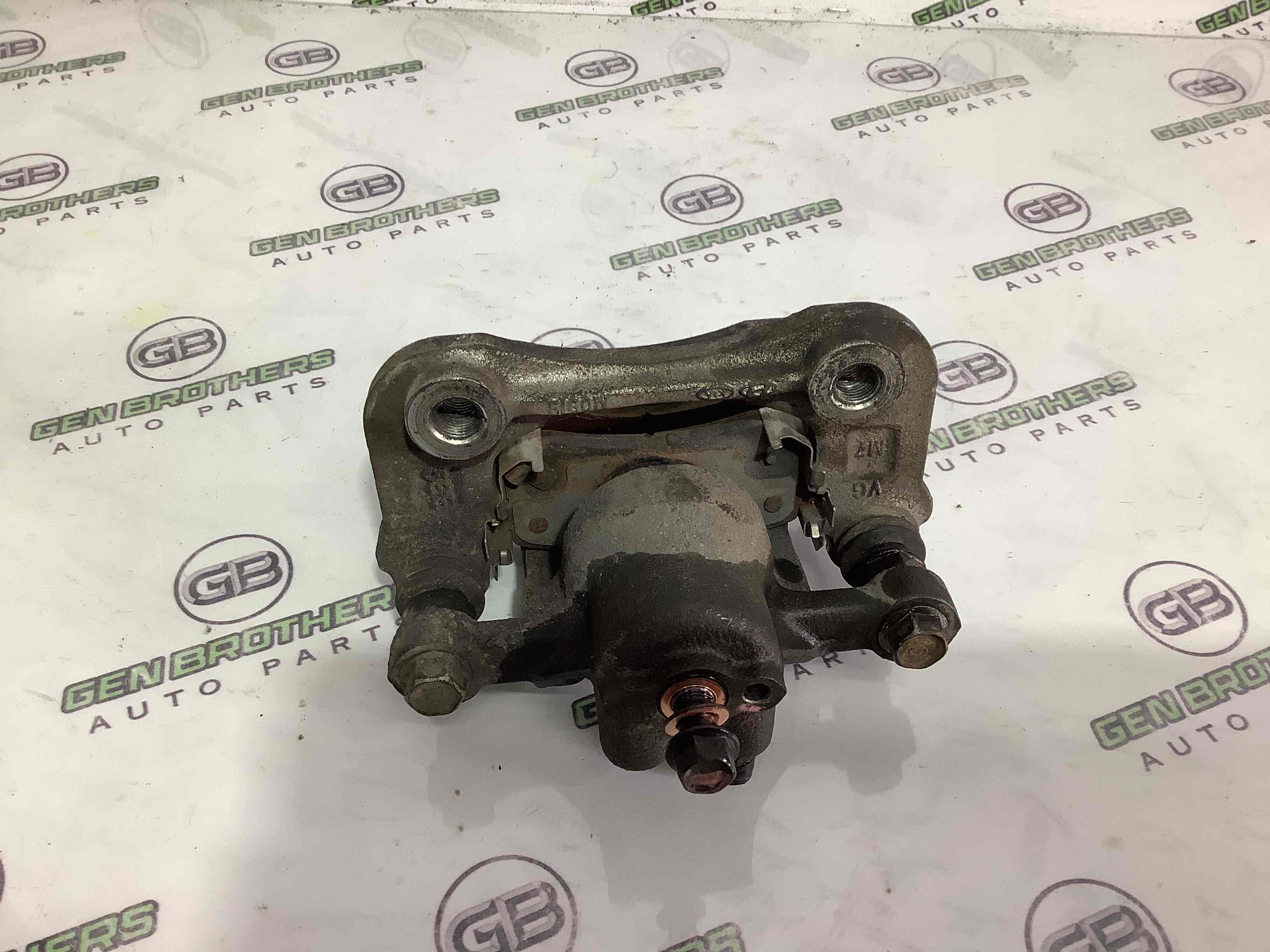 Супорт задній правий