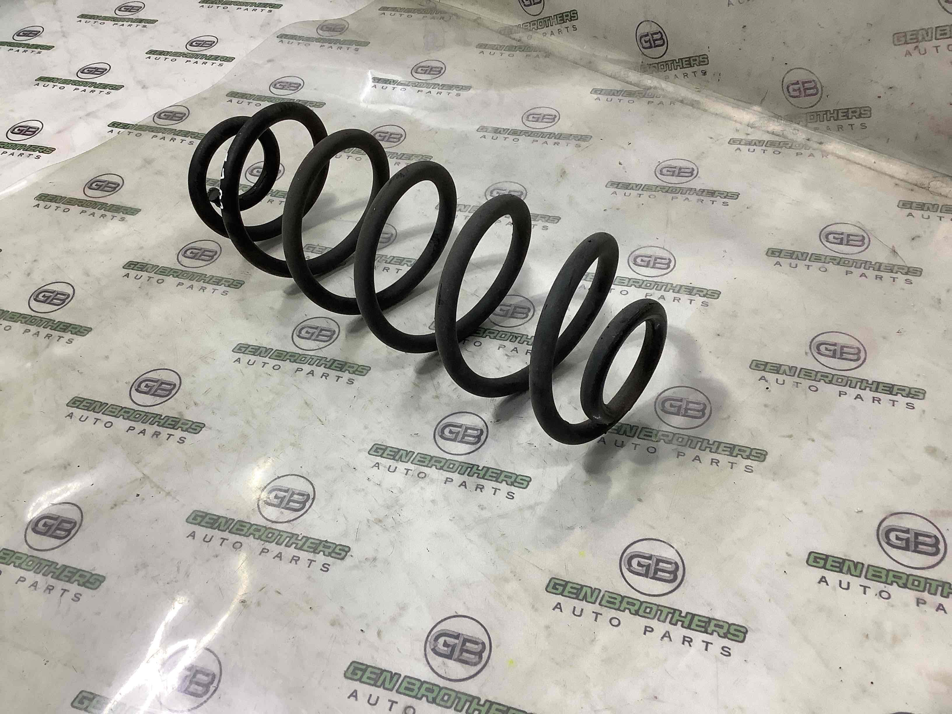 Пружина задняя