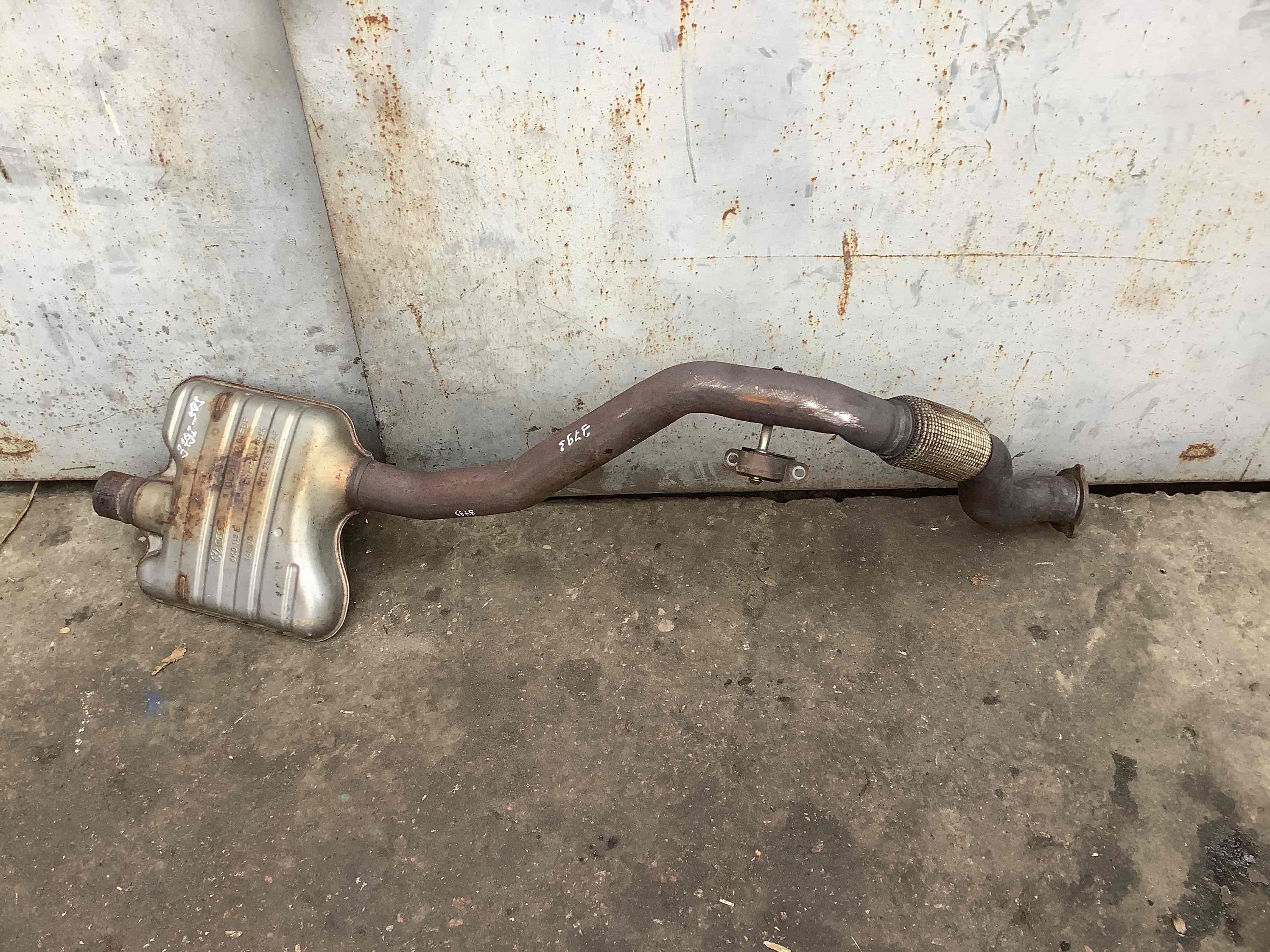 Приемная труба глушителя