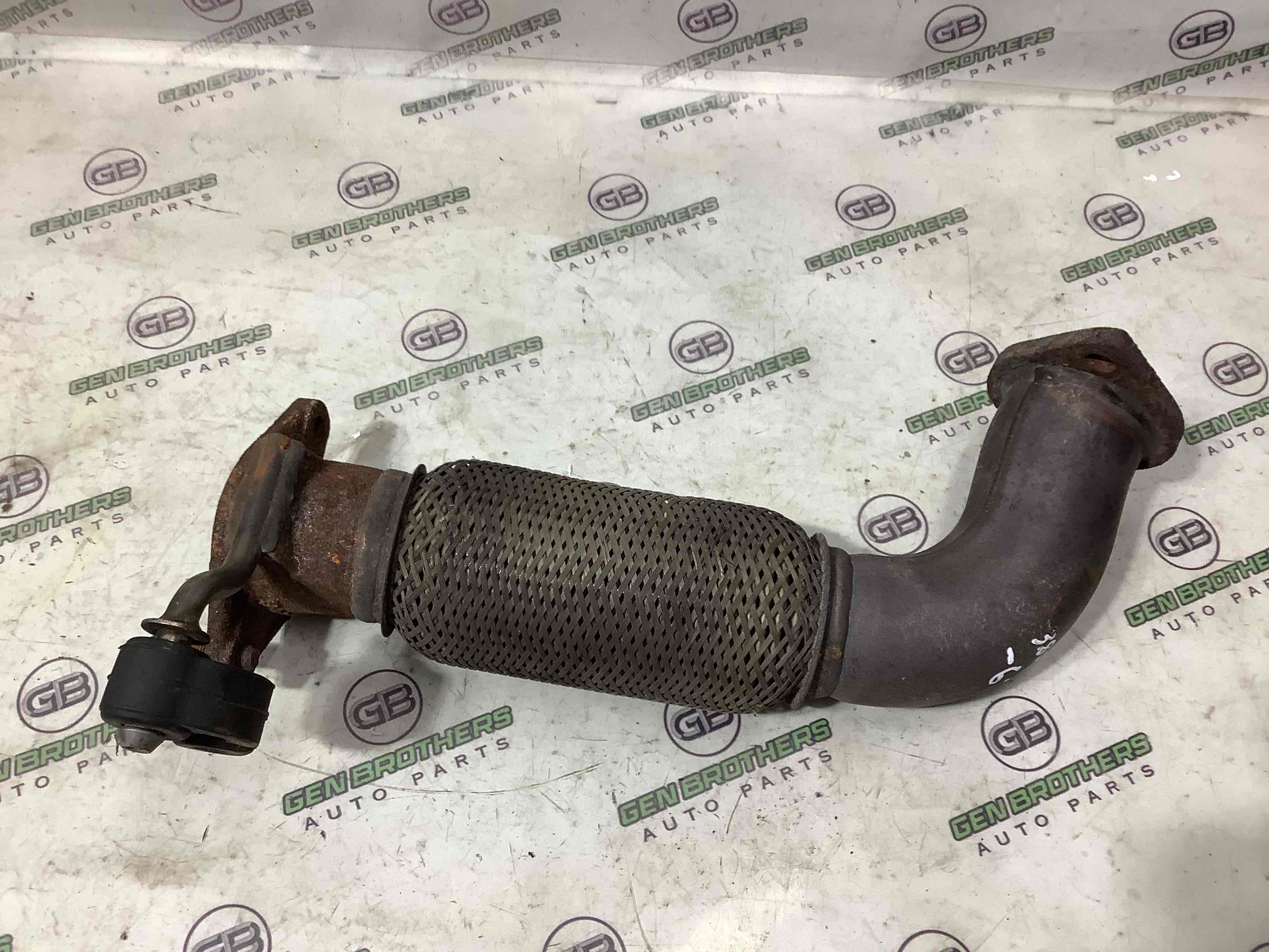 Приемная труба глушителя