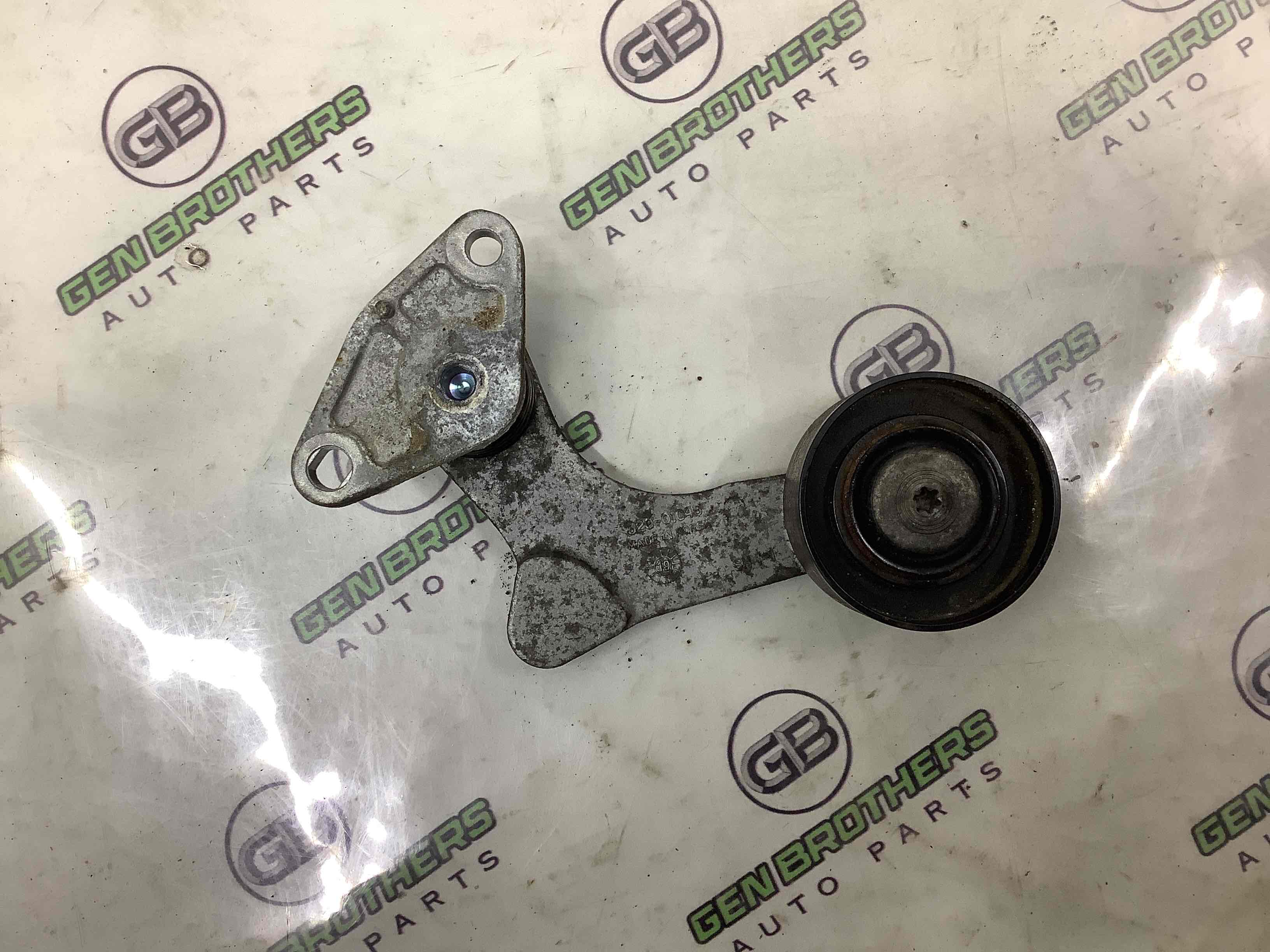 Механізм натягу ременя, ланцюга, ролика