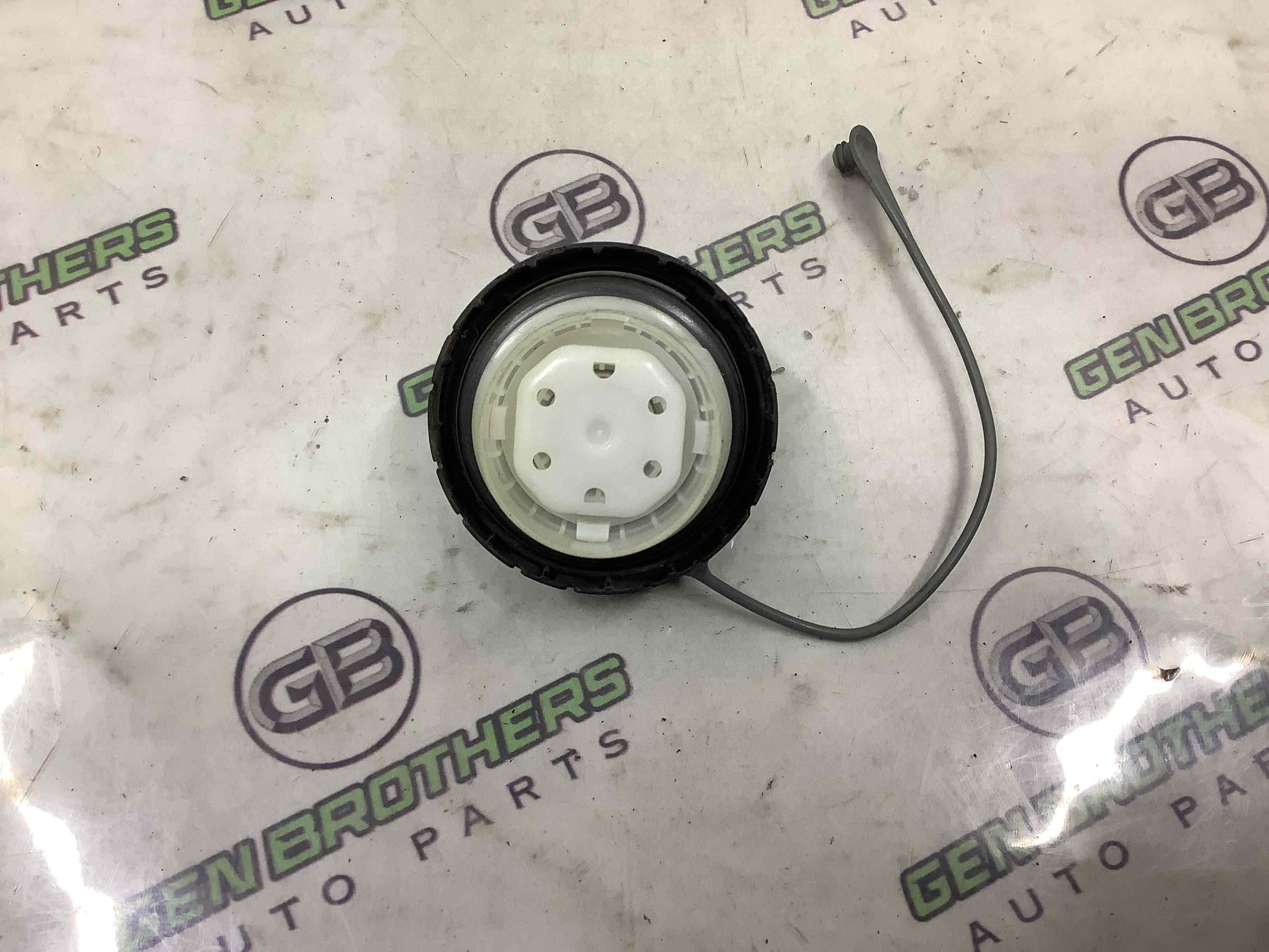 Корок бака, кришка заливної горловини, дотяжка