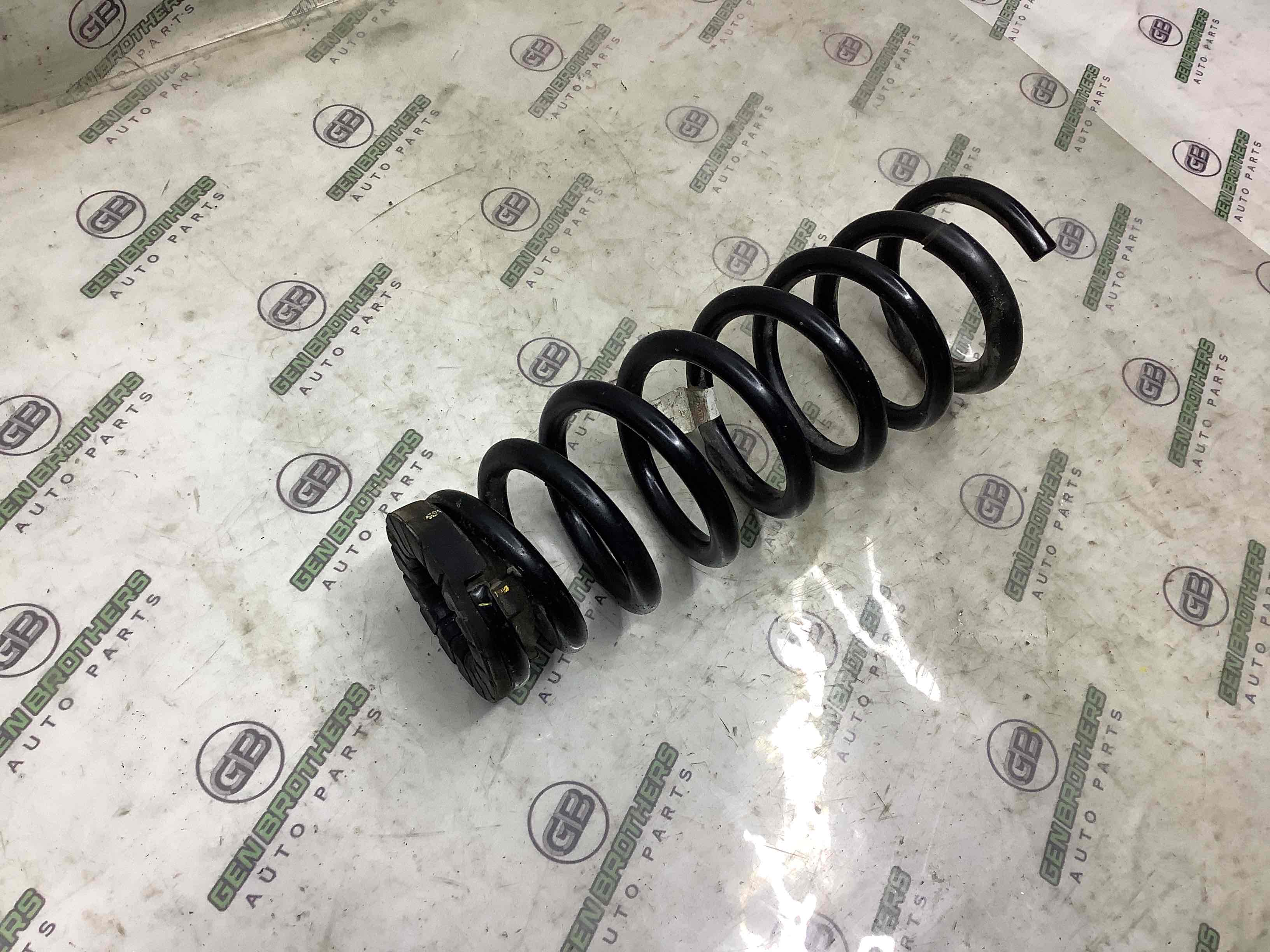 Пружина задня