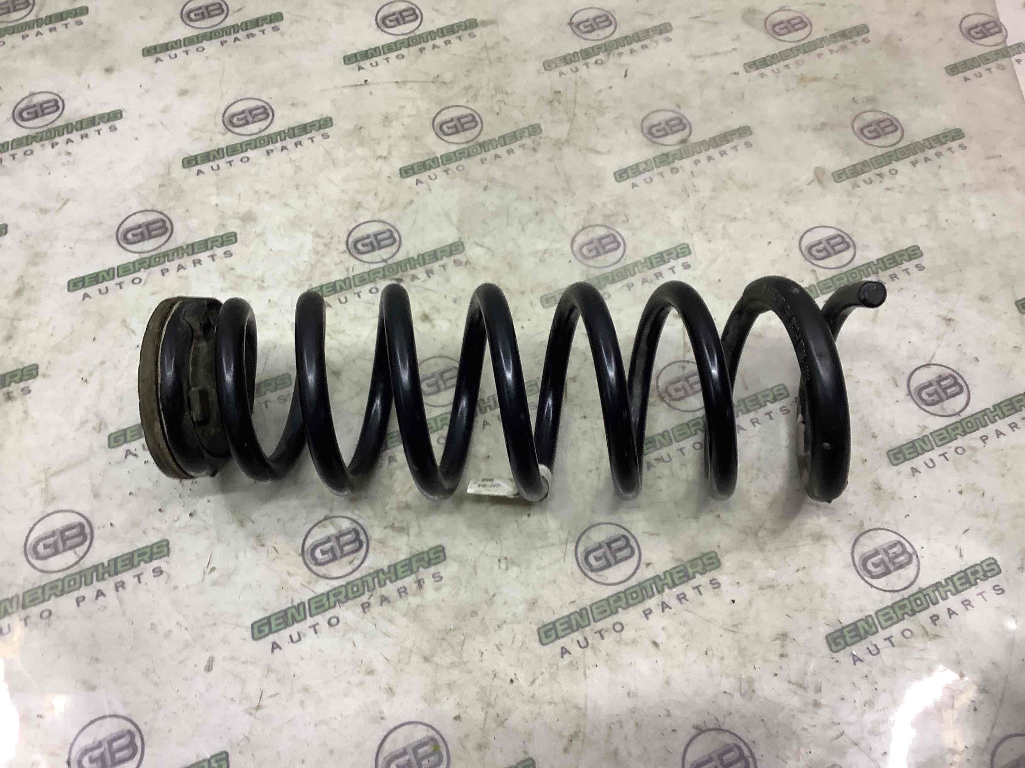 Пружина задня