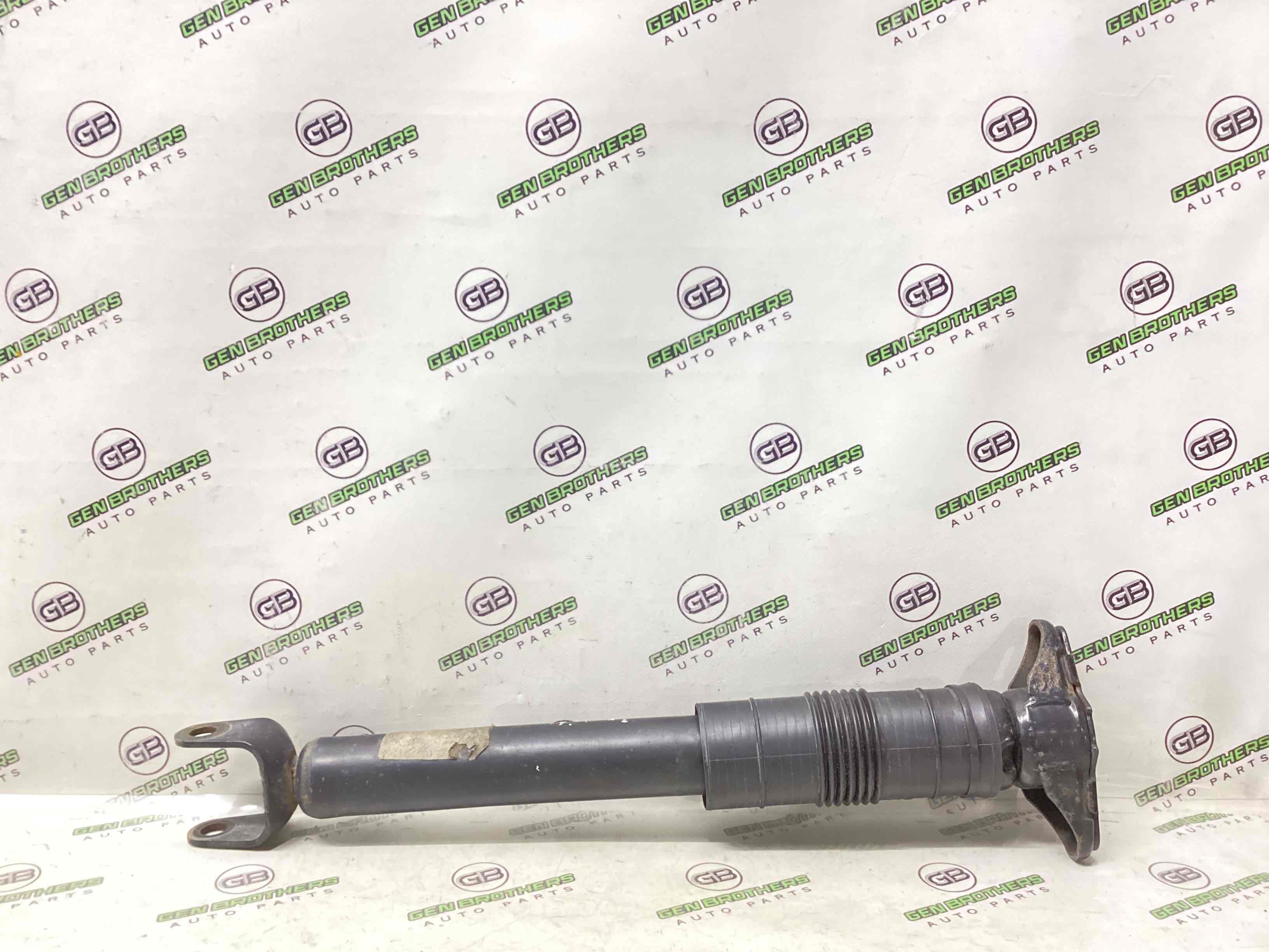 Амортизатор задний левый