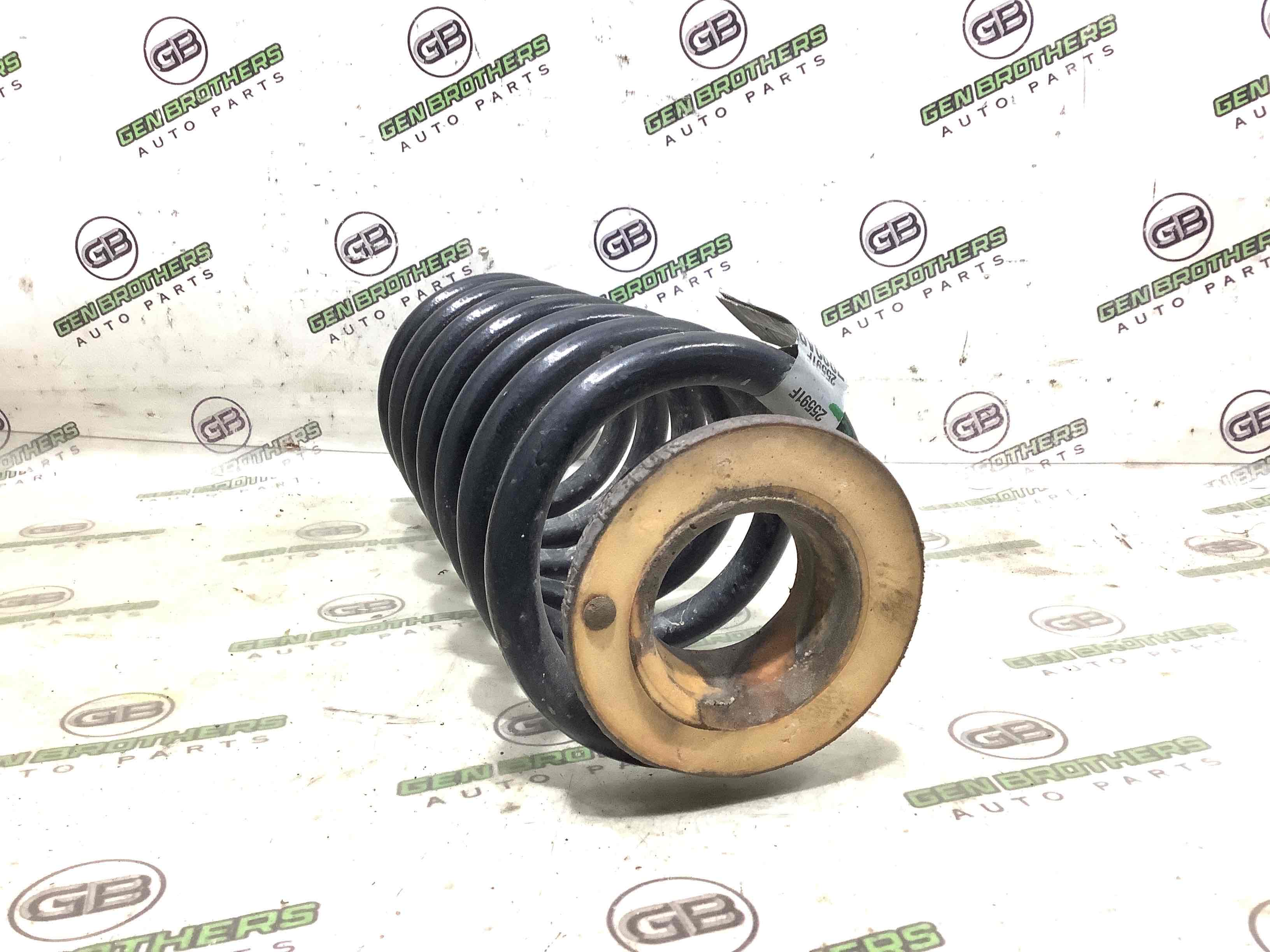 Пружина задня