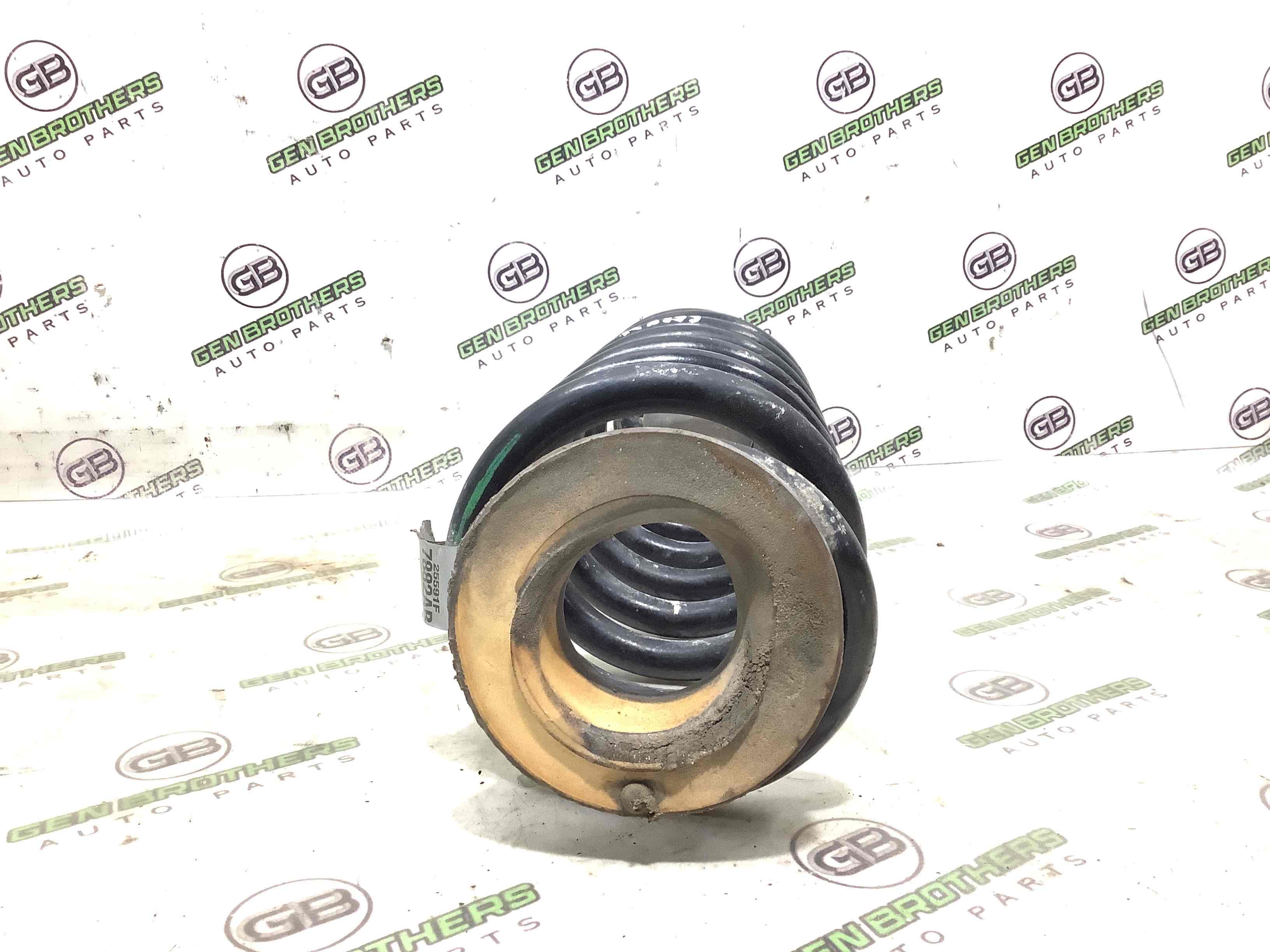 Пружина задня