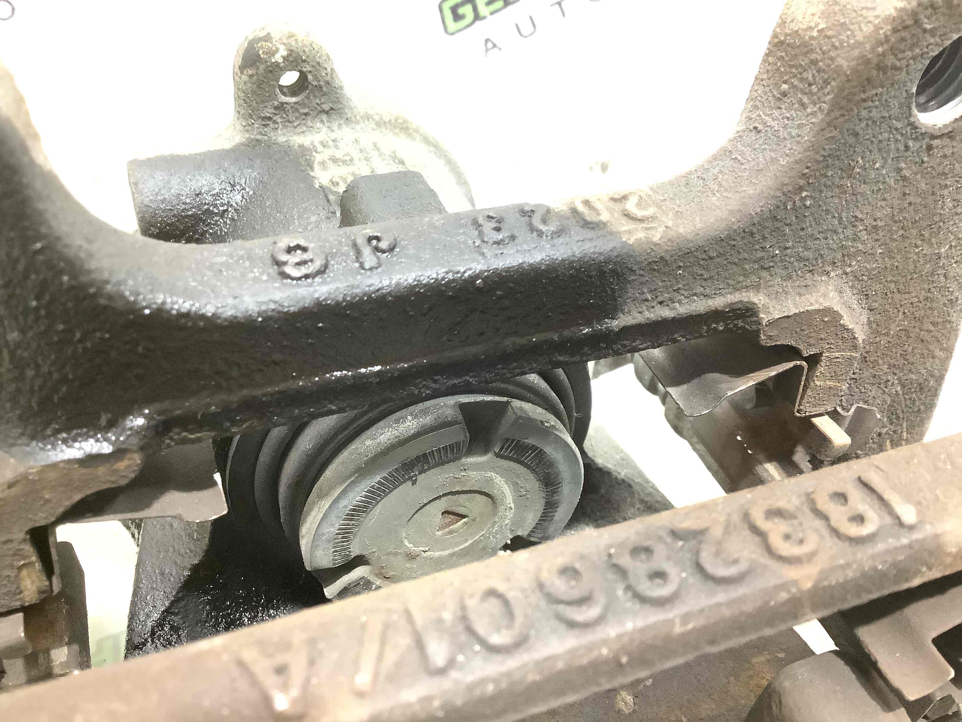 Супорт задній лівий