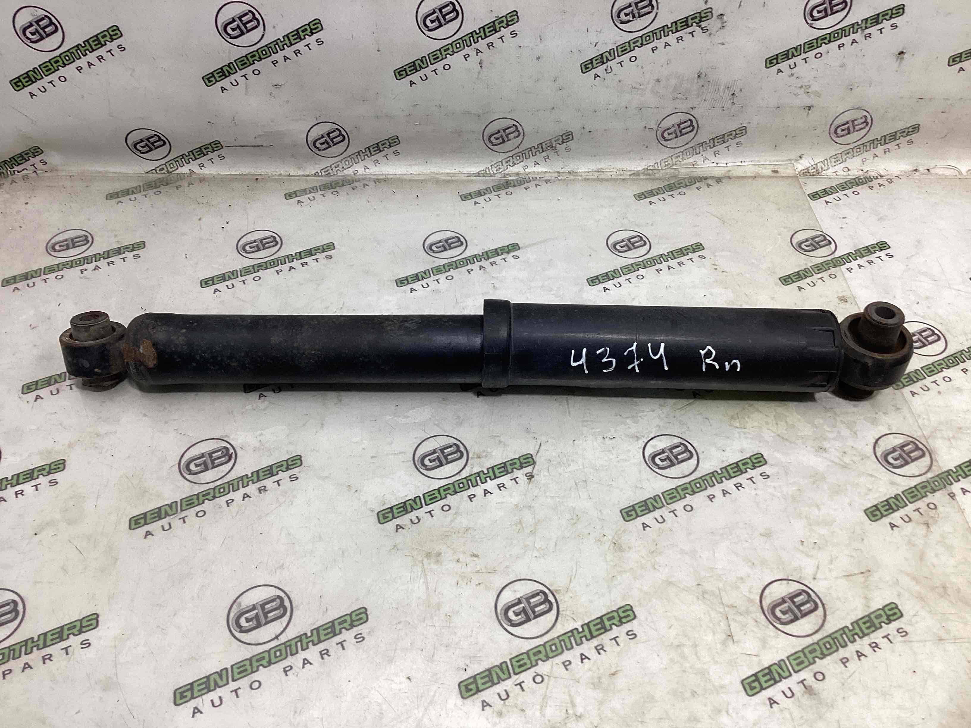 Амортизатор задній правий